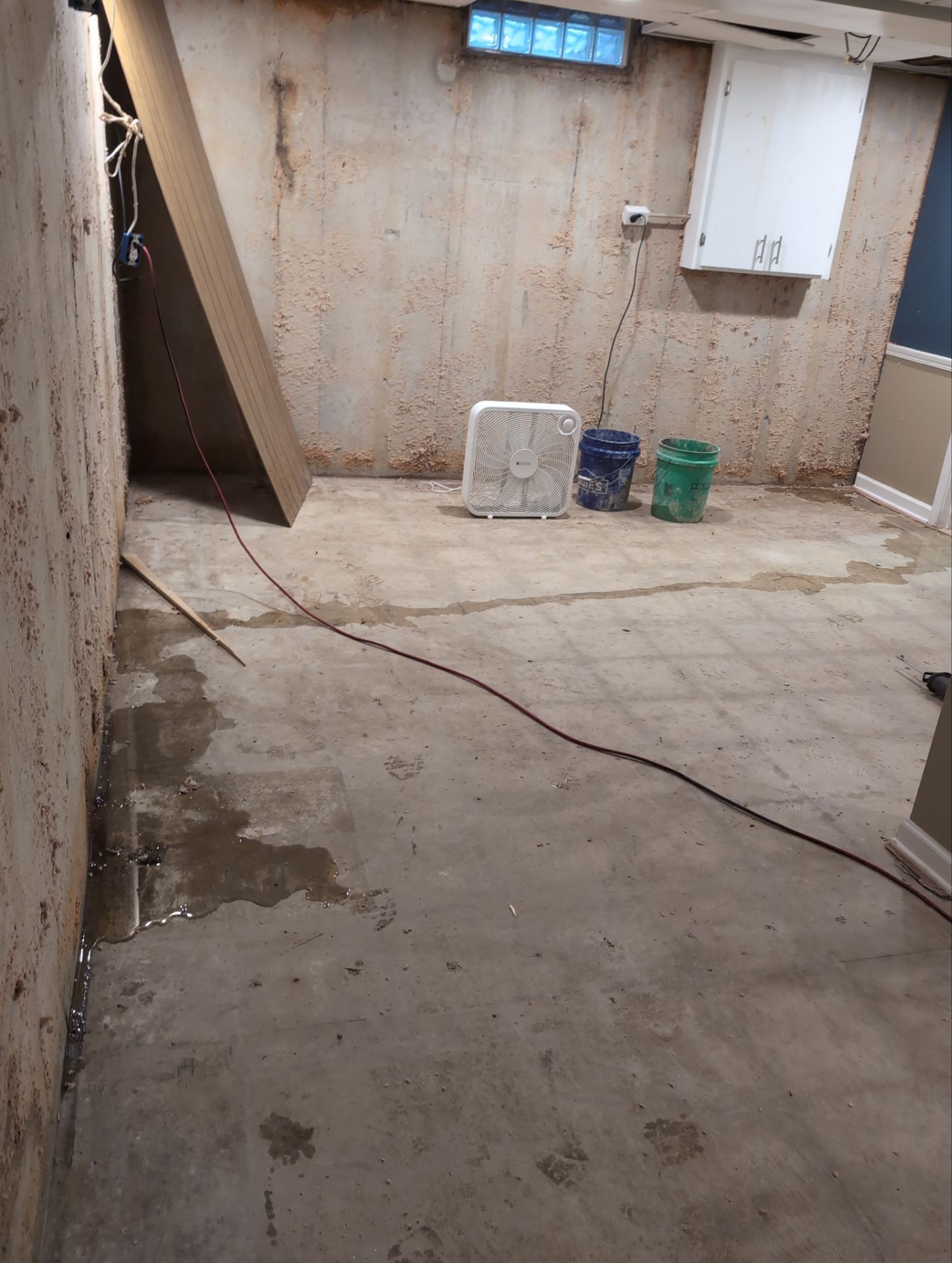Interior Basement Waterproofing System and Egress Window Installation by Toledo Basement Repair 