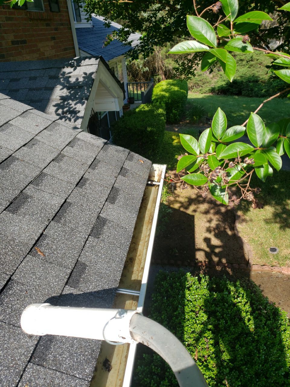Gutter Cleaning using water by Power Wash Masters LLC