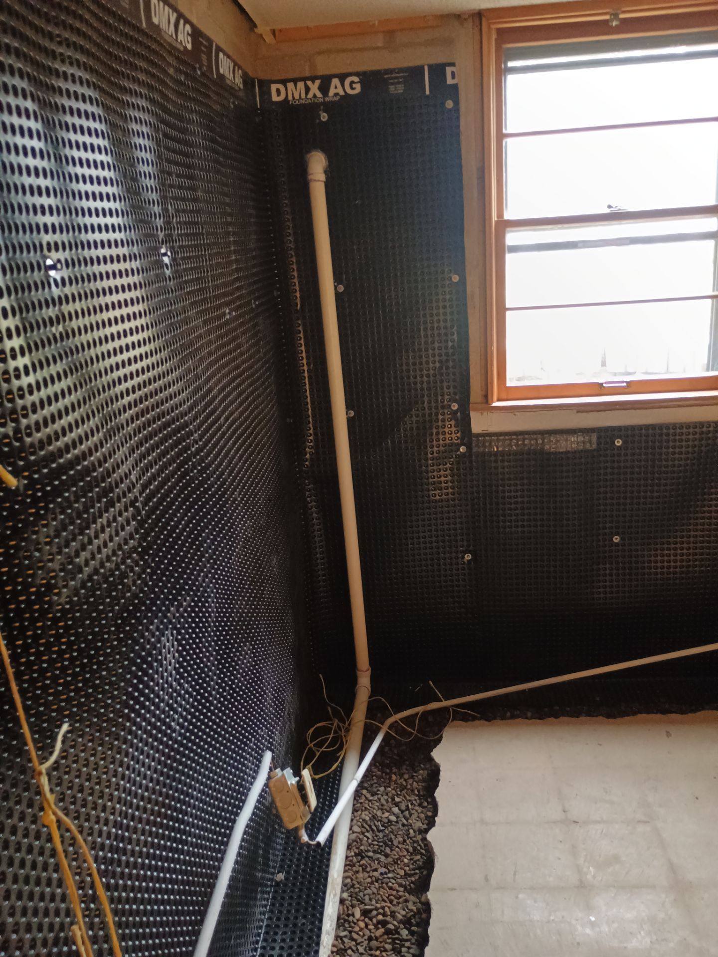 Interior Drain Tile & Foundation Crack Repair in St. Anthony, MN by Waterproofing Northeast