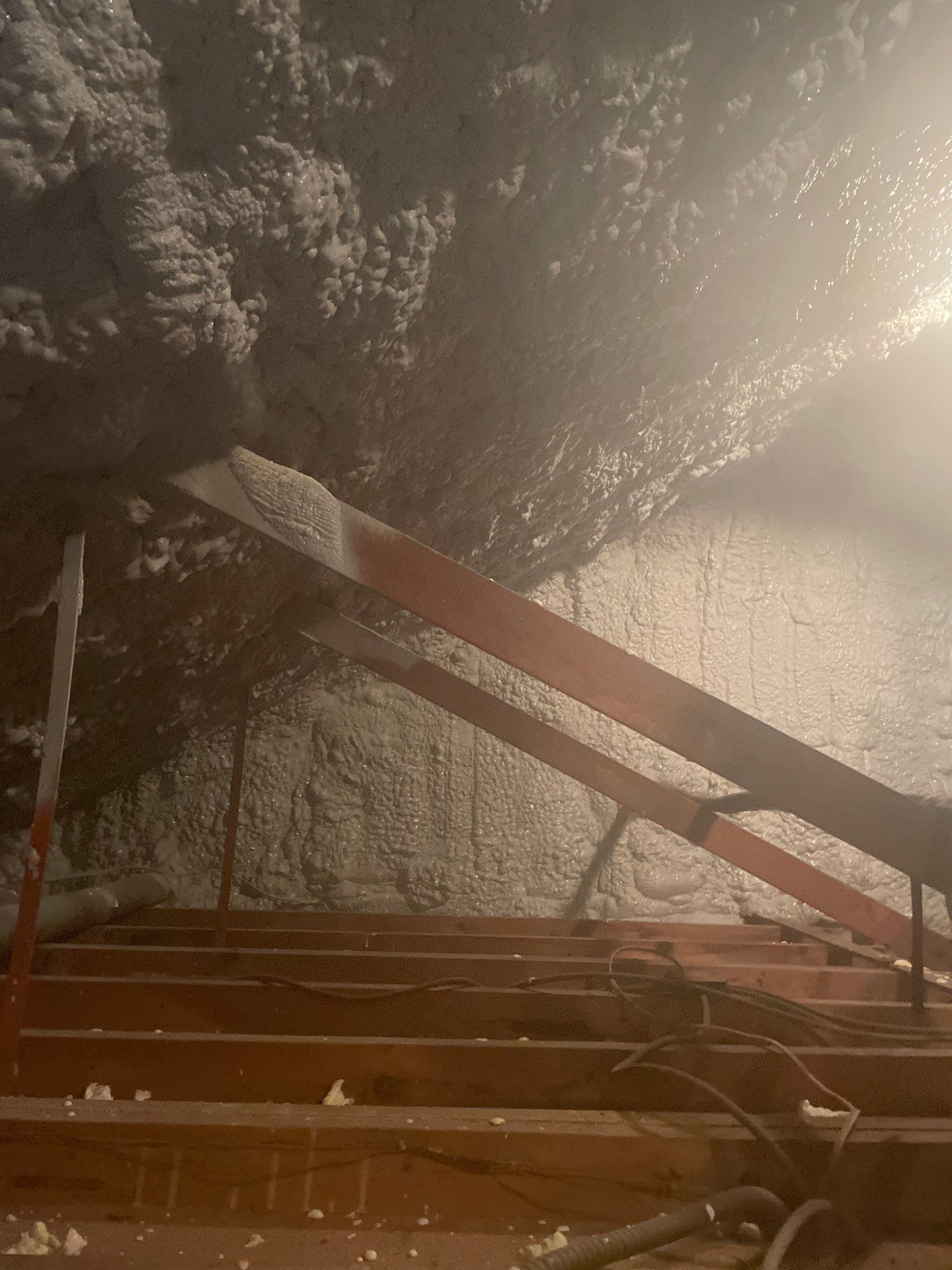Attic Insulation using open cell spray foam by NYS Foam & Energy