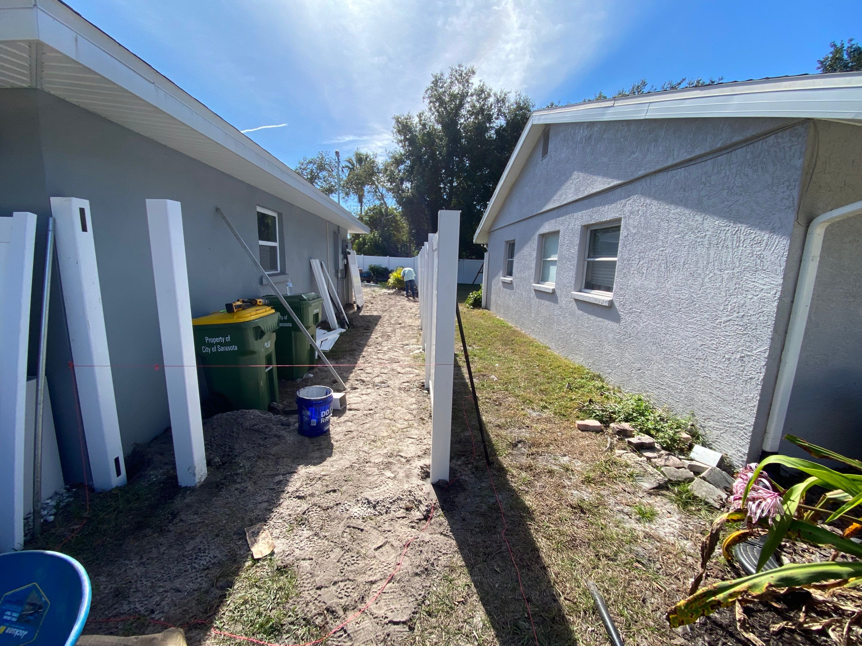 Vinyl Privacy Fence With AC Enclosure and Storage Corral by Asap fence and gates, LLC