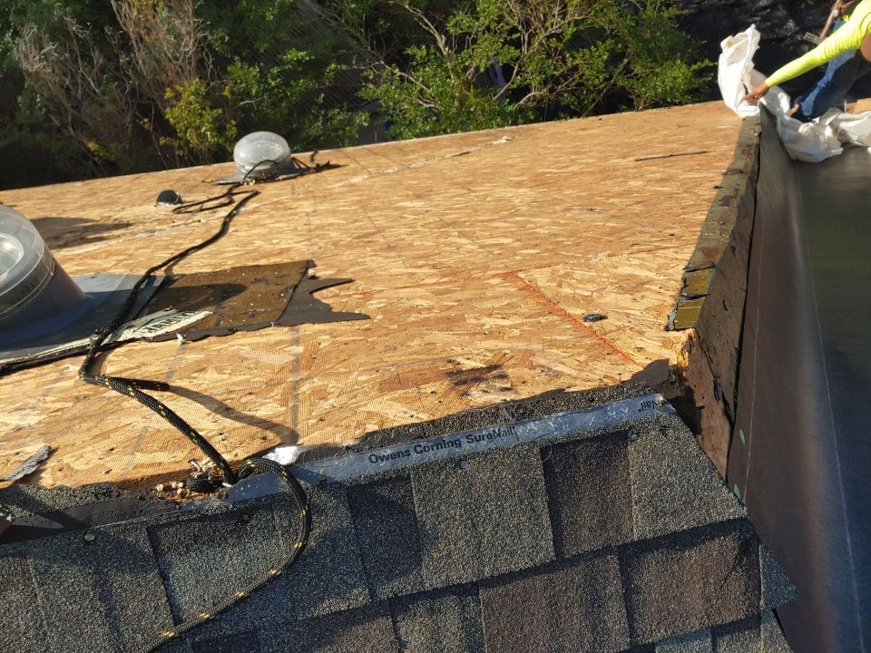 Residential Roof Replacement and Solar Panel Integration in Austin by Caliber Restoration LLC