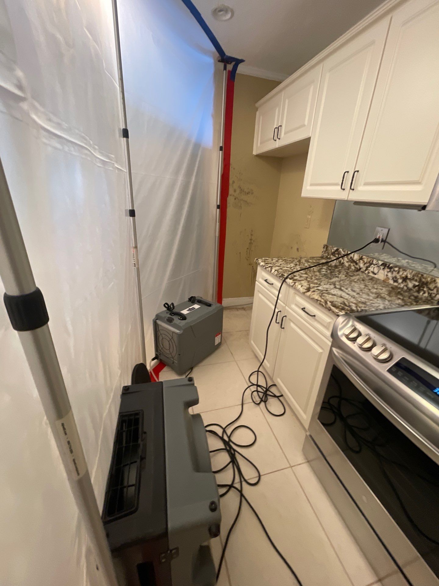 Mold remediation and rebuild of kitchen and living areas by Bay Coast Restoration 