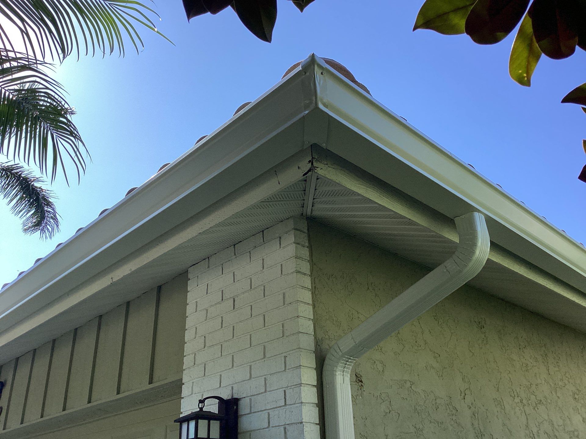 White Gutter Installation in Sarasota FL by Gutter Professors