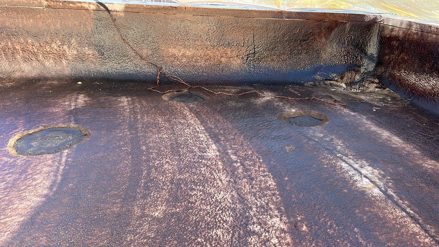 Foam Refurbish using Conklin Benchmark/PUMA XL coatings and spray foam; Also metal roofing around parapet wall by Straight Edge Roofing Inc