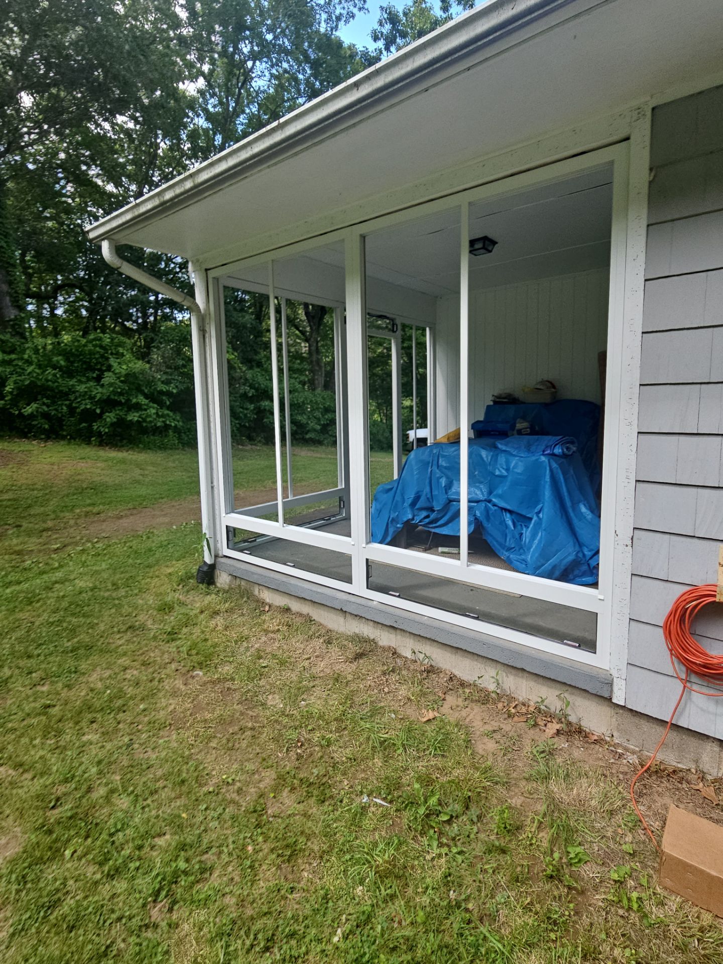 Summer Space Porch Enclosure by DiGiorgi Roofing and Siding Inc