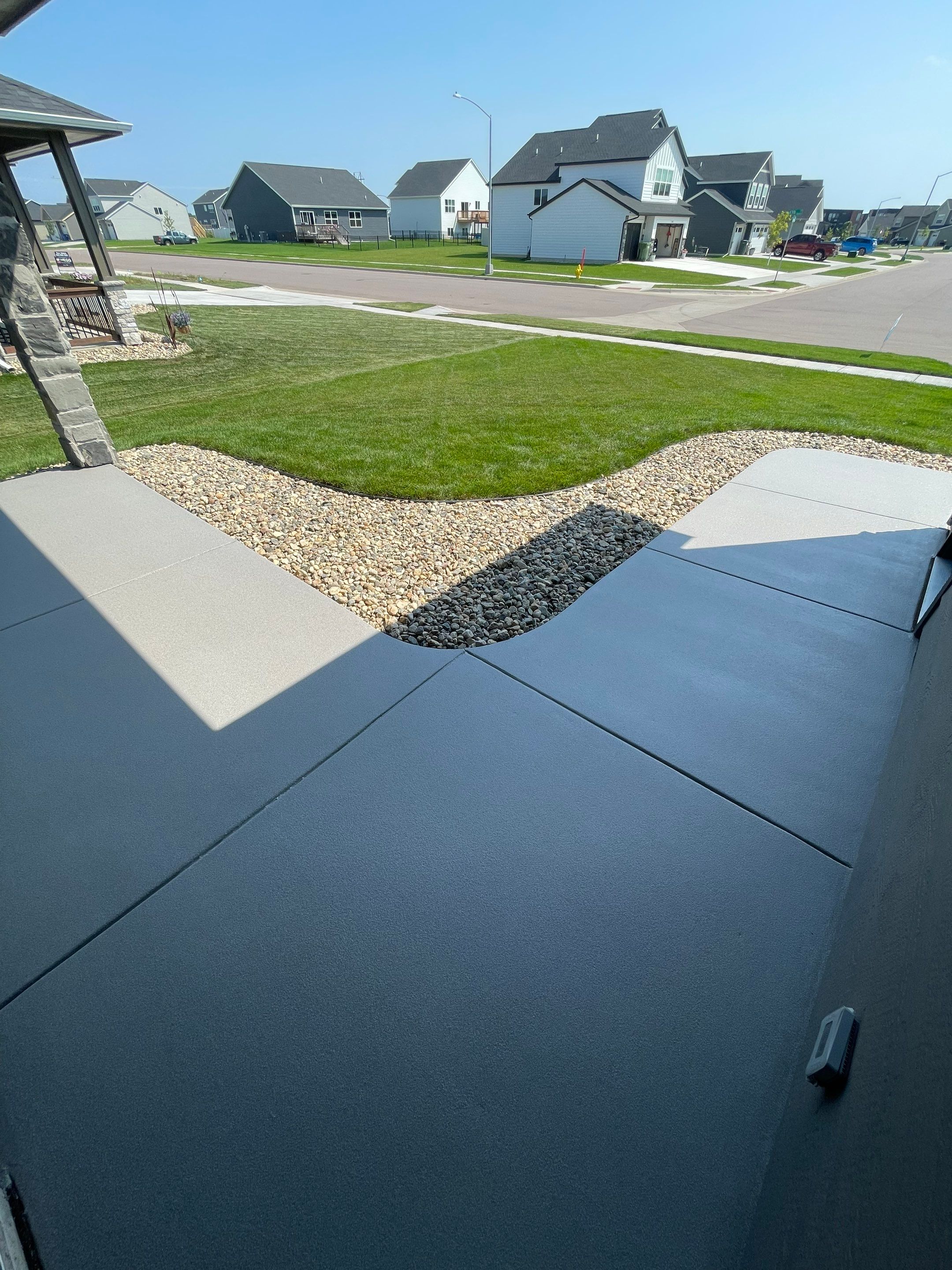 Sioux Falls Residential Concrete Patio and Walkway Coating by Select Painting, Coatings & Garage Cabinets