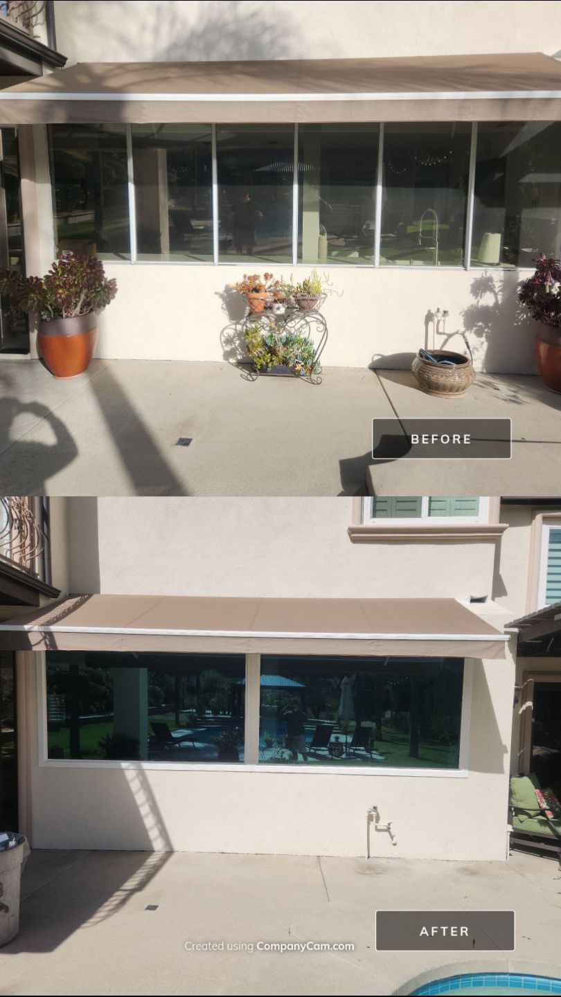 Window Installation using Anlin vinyl windows with Sunshield glass by American Window Company