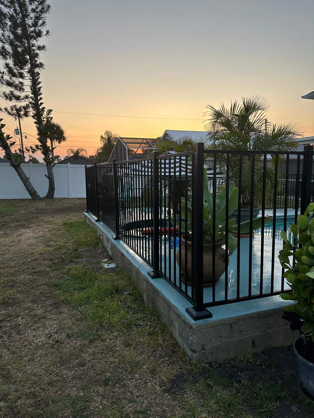 Black Aluminum Pool Fence Installation in Port Charlotte by True Fence LLC