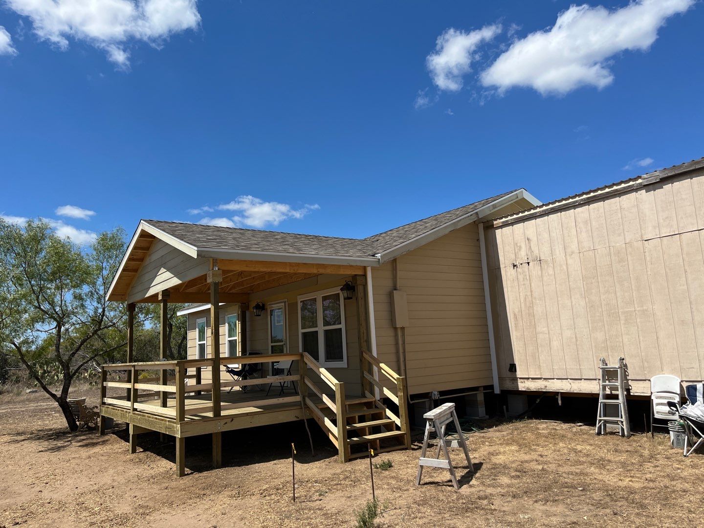 Front Porch Sitt'n by Bayfront Roofing and Construction