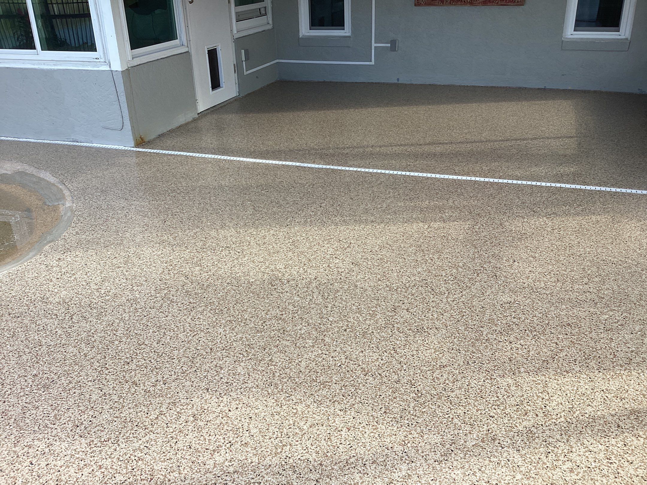 Pool Deck using Pecan by Amvet concrete coatings llc