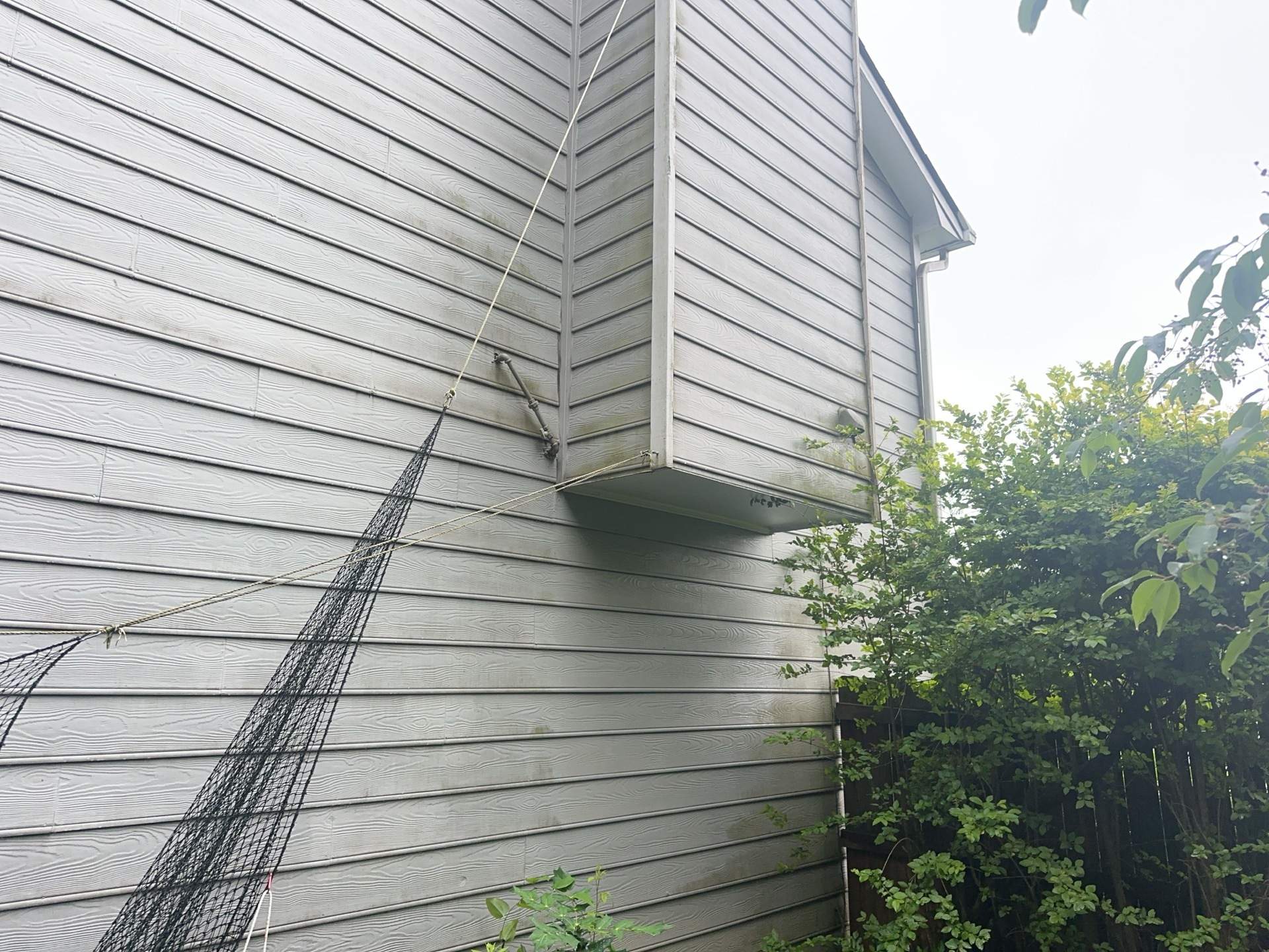 Alpharetta, GA Partial Siding Replacement, Porch Stain, and Exterior Painting by Nelson Exteriors 