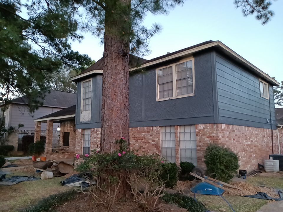 Interior and exterior painting project by Roof Concepts Construction