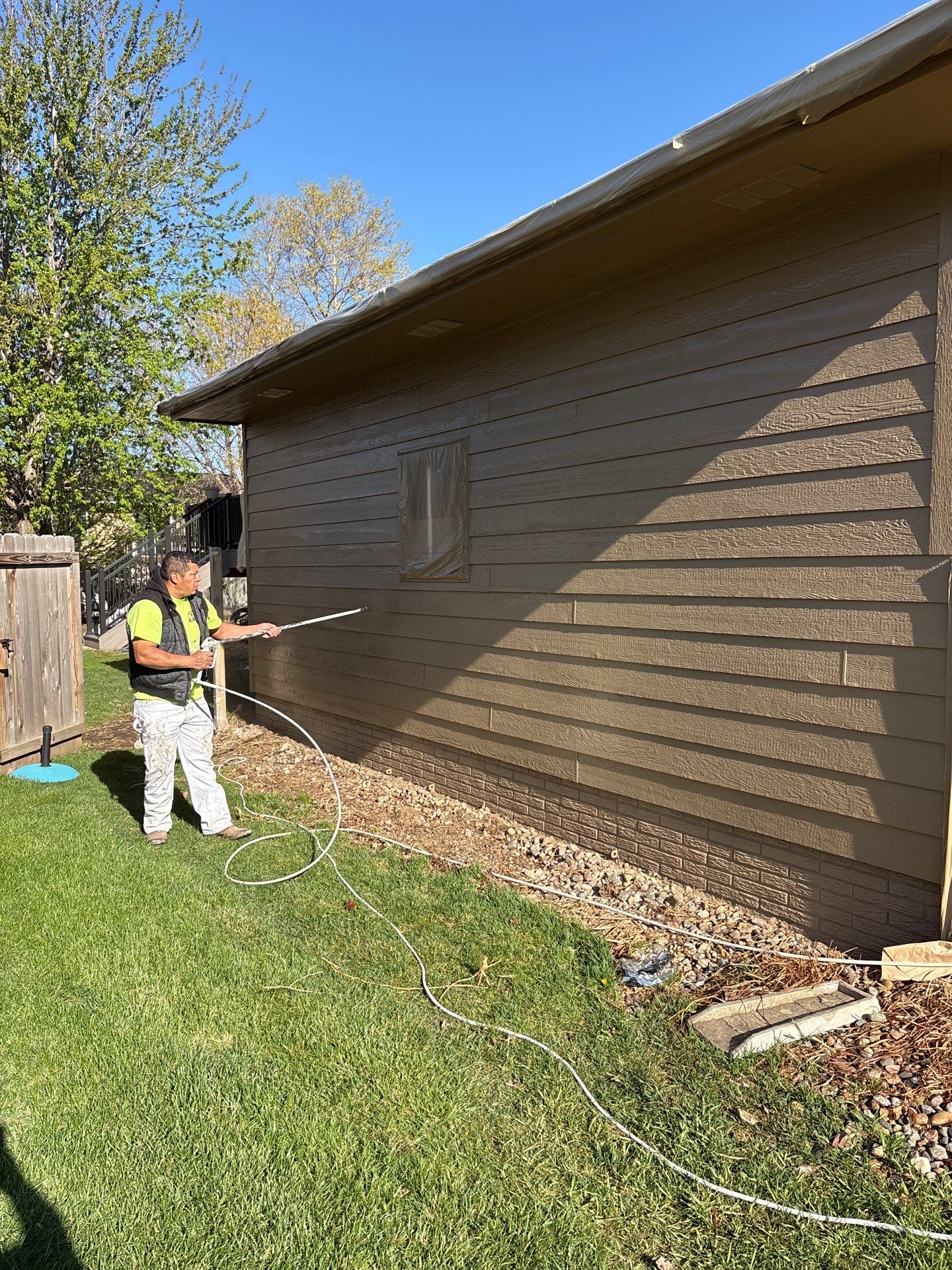 Exterior Painting and Wood Trim Replacement in Sioux Falls by Select Painting, Coatings & Garage Cabinets