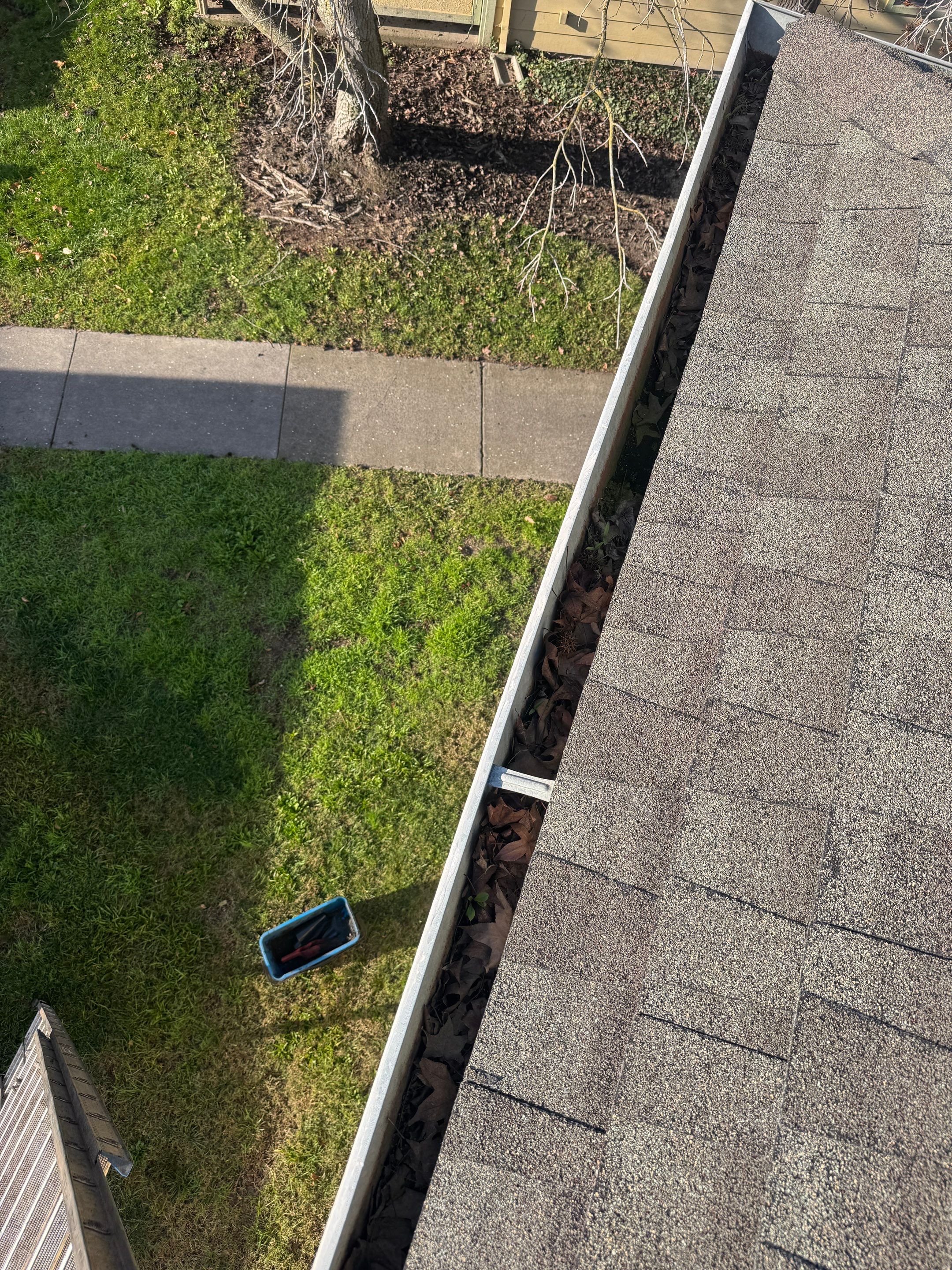 Commercial gutter cleaning Elk Grove, CA before photo with filled gutters