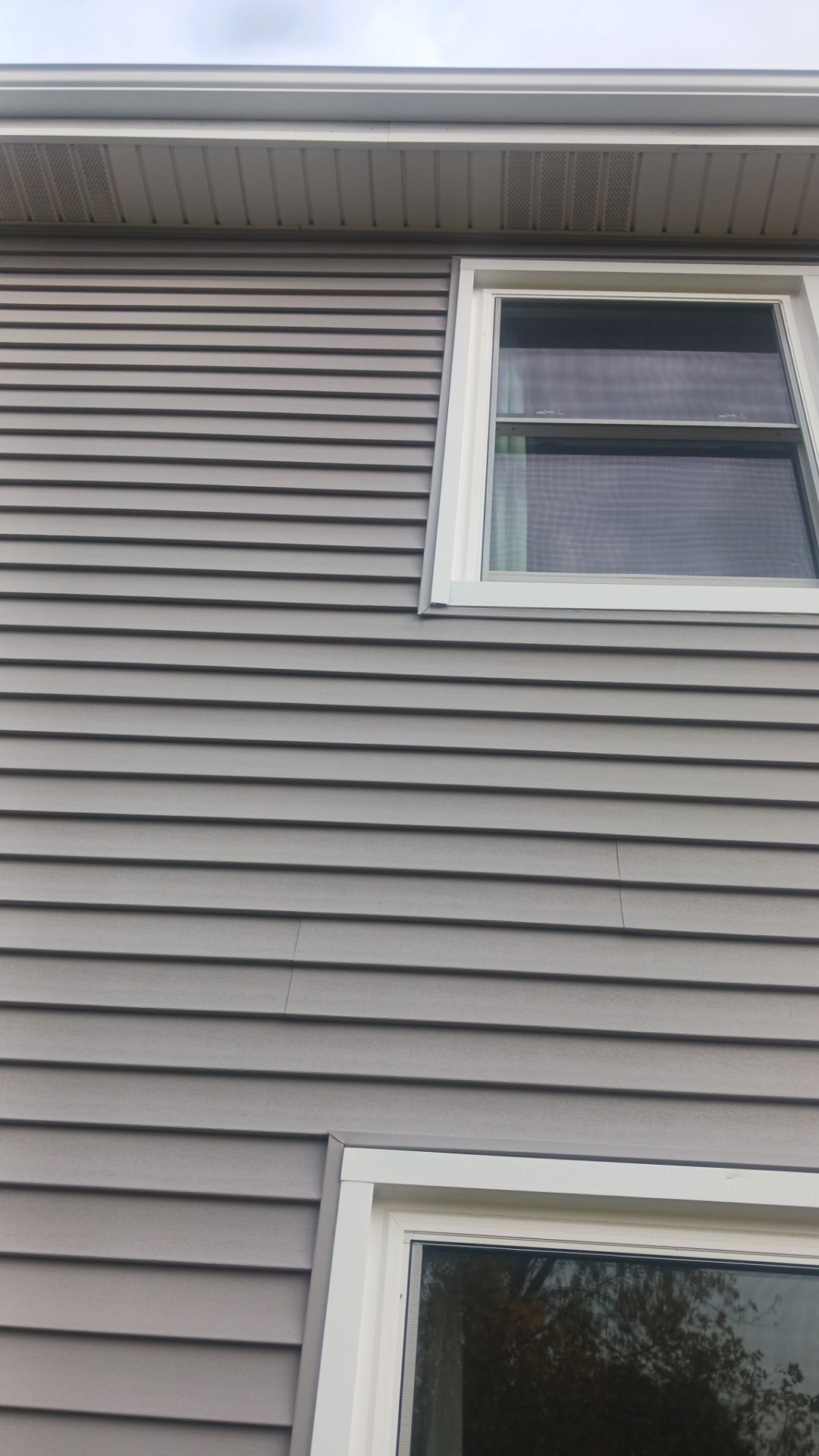 New Siding and Windows by NextWave Construction