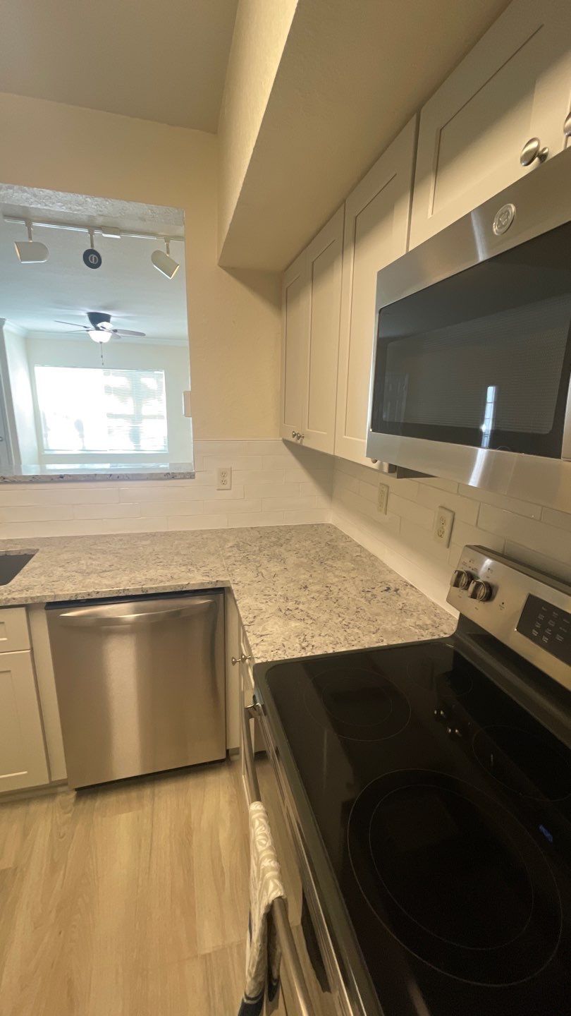 Home Remodel using LVP Flooring and Cabinets by HandyMangum