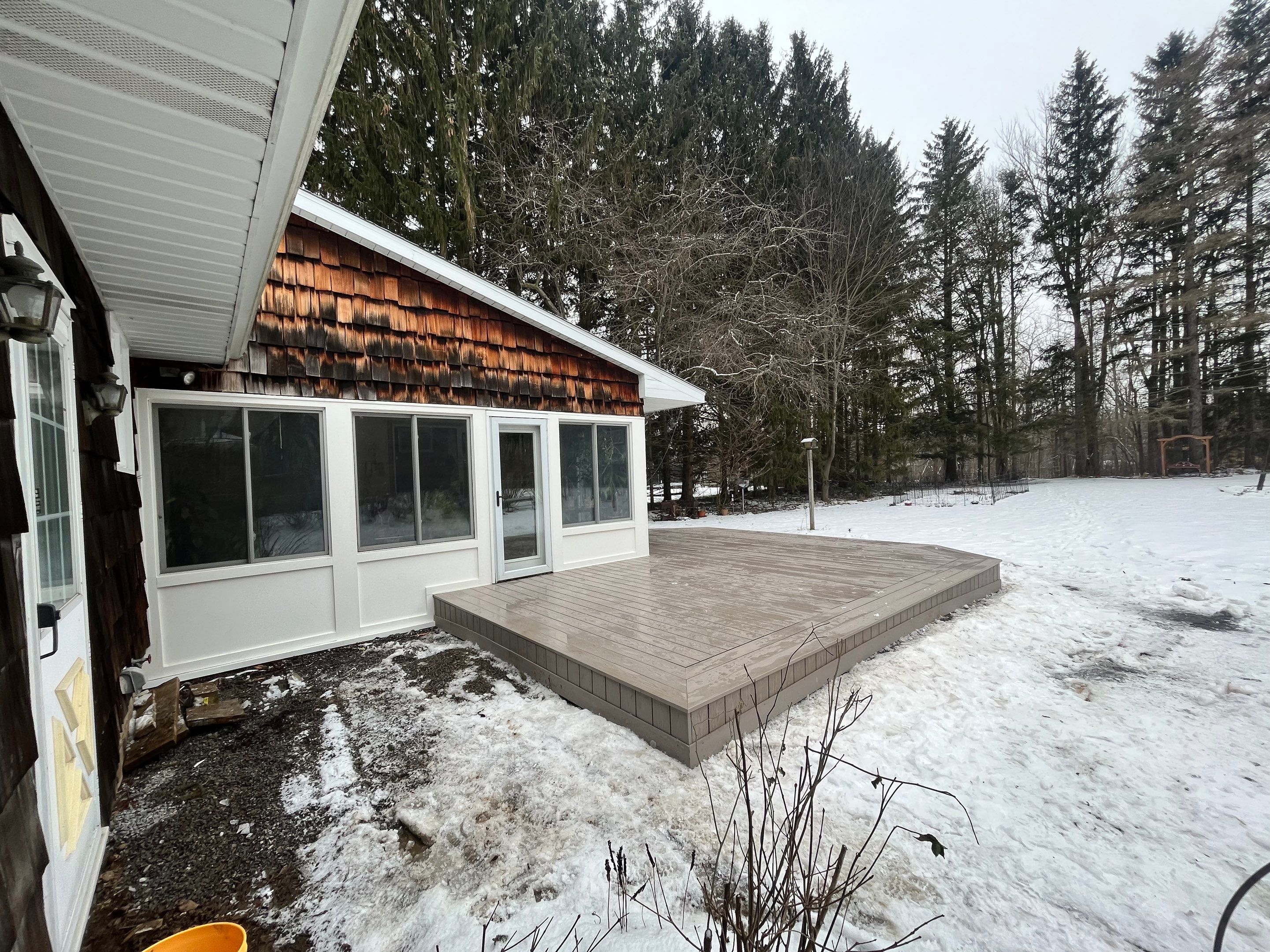 Deck and Stamped Concrete by Ivy Lea Construction