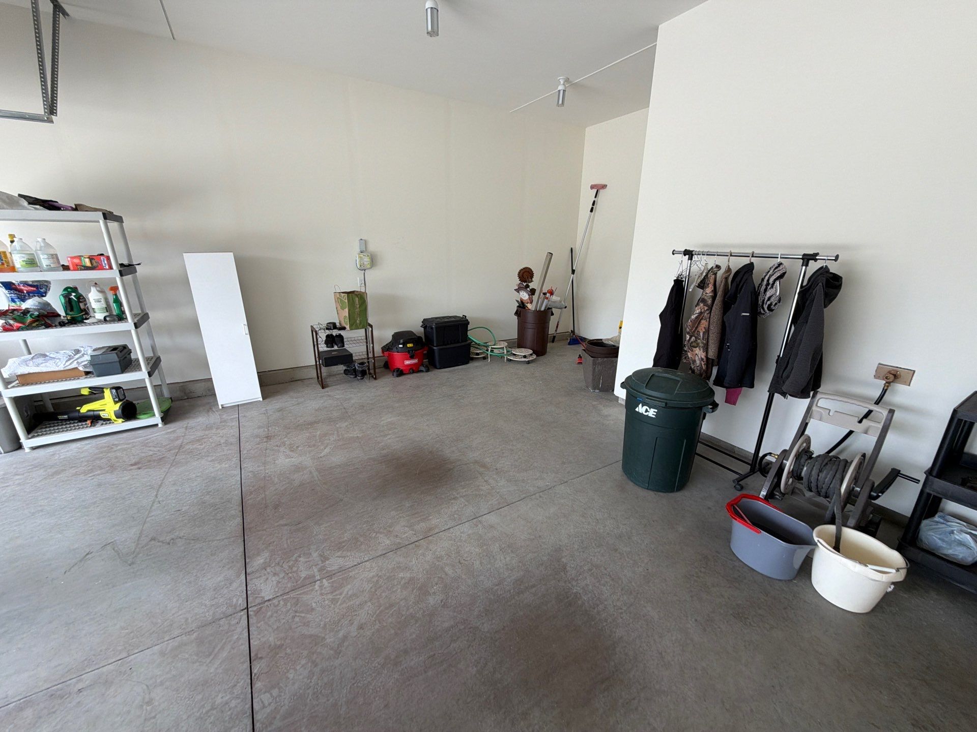 Cabin Fever Garage Floor Coating in Sioux Falls by Select Painting, Coatings & Garage Cabinets