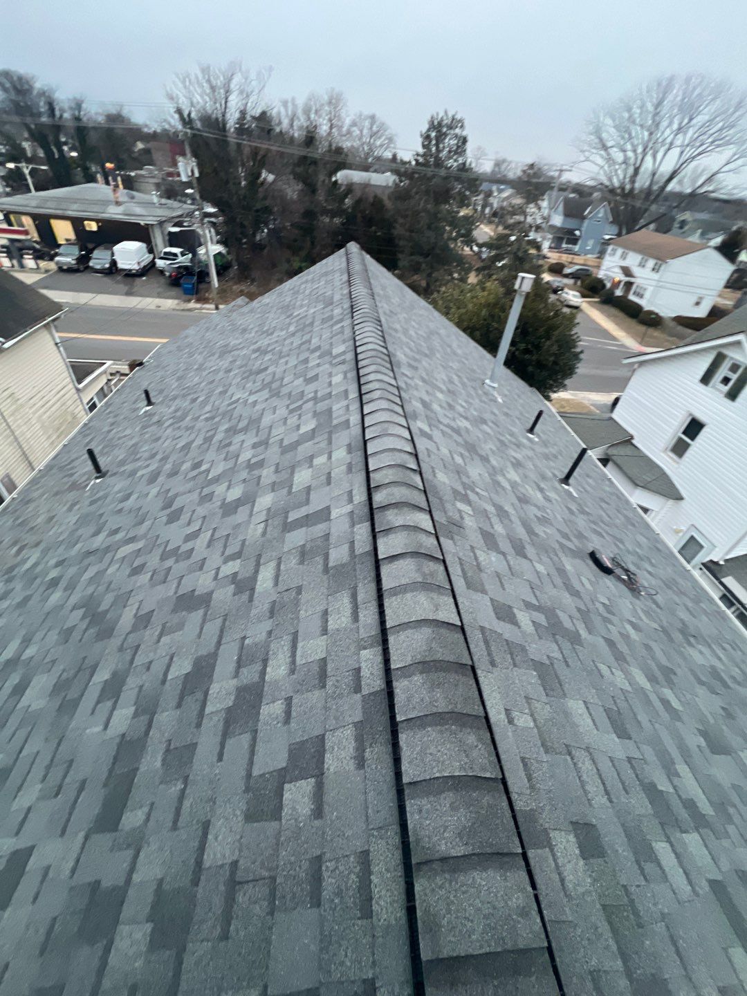 Estate Gray Shingles by Reimagine Roofing