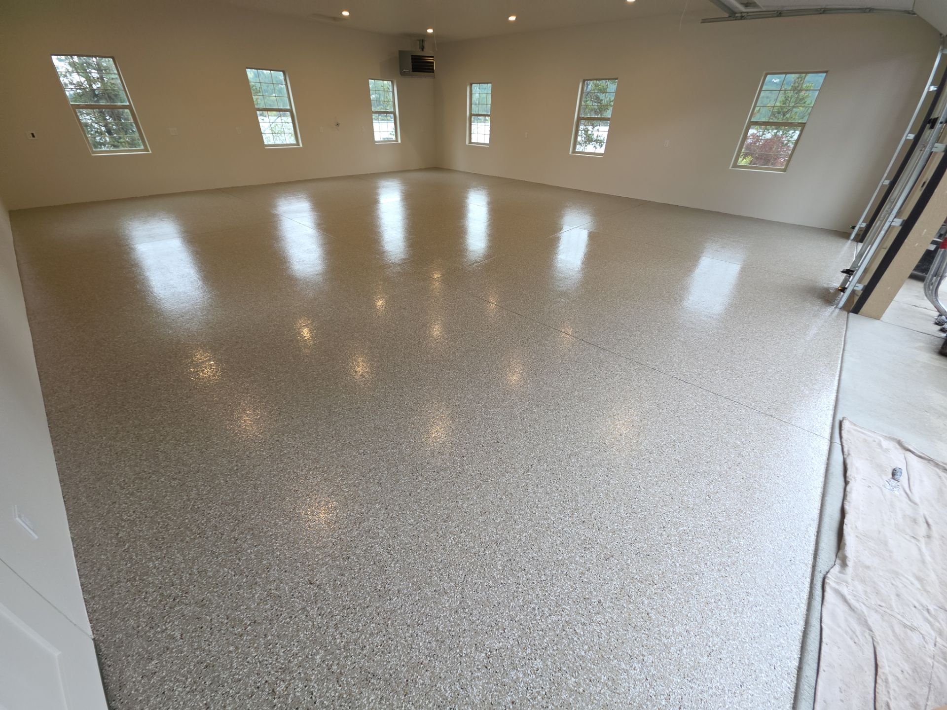 Pebble Beach Polyaspartic Garage Floor Coating in Liberty Lake by Croc Coatings, LLC