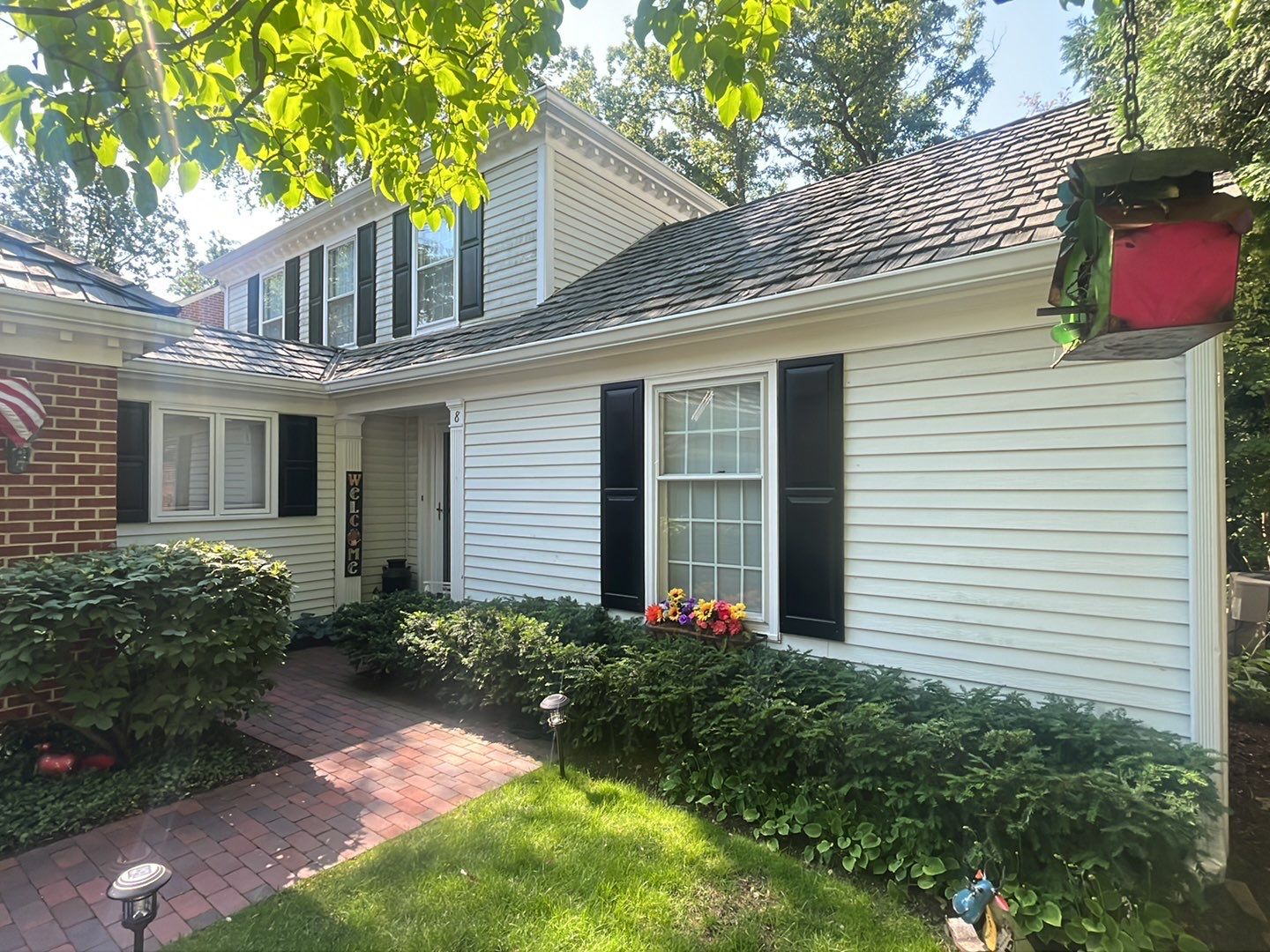 Housewashing  using Algaecide, soft wash soap by Northern Power Washing LLC.