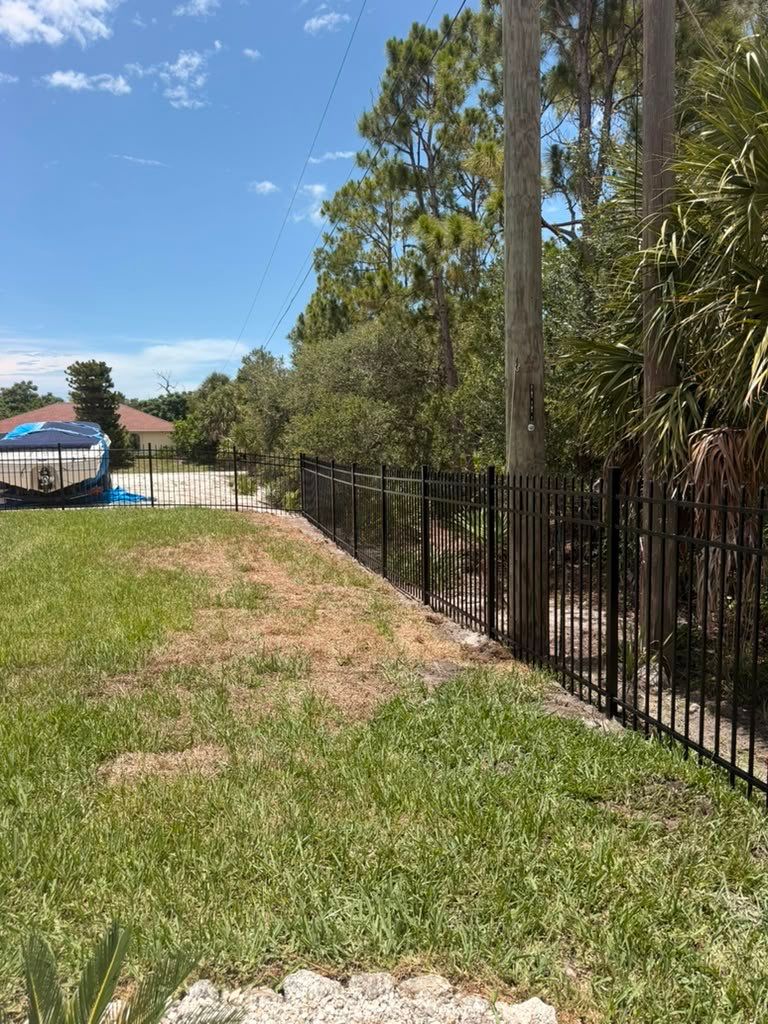Black Aluminum Spear Top Picket Fence Installation in Englewood by True Fence LLC
