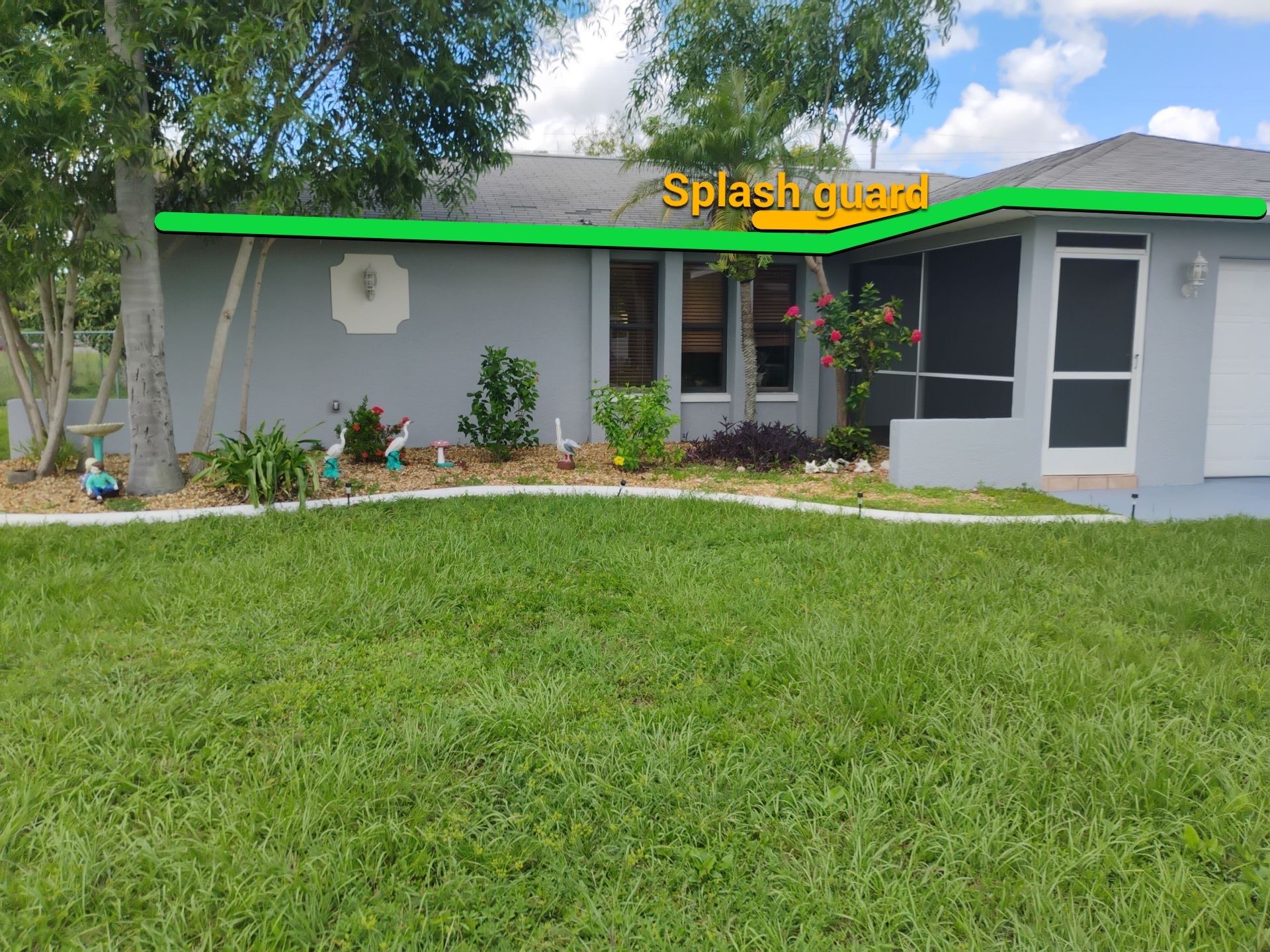 New Gutter System with Splash Guards in Cape Coral FL by Gutter Professors