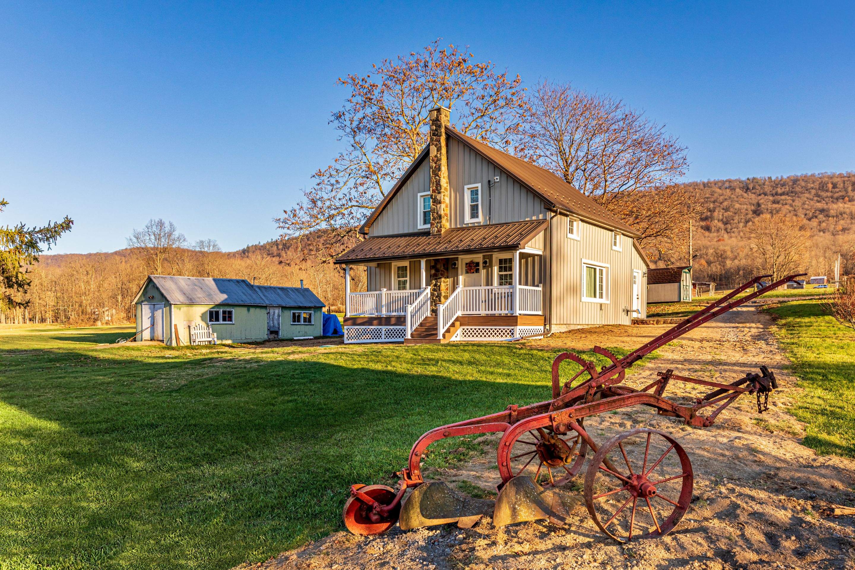 Metal roof-charcoal  Metal siding-ash gray by Esh Builders