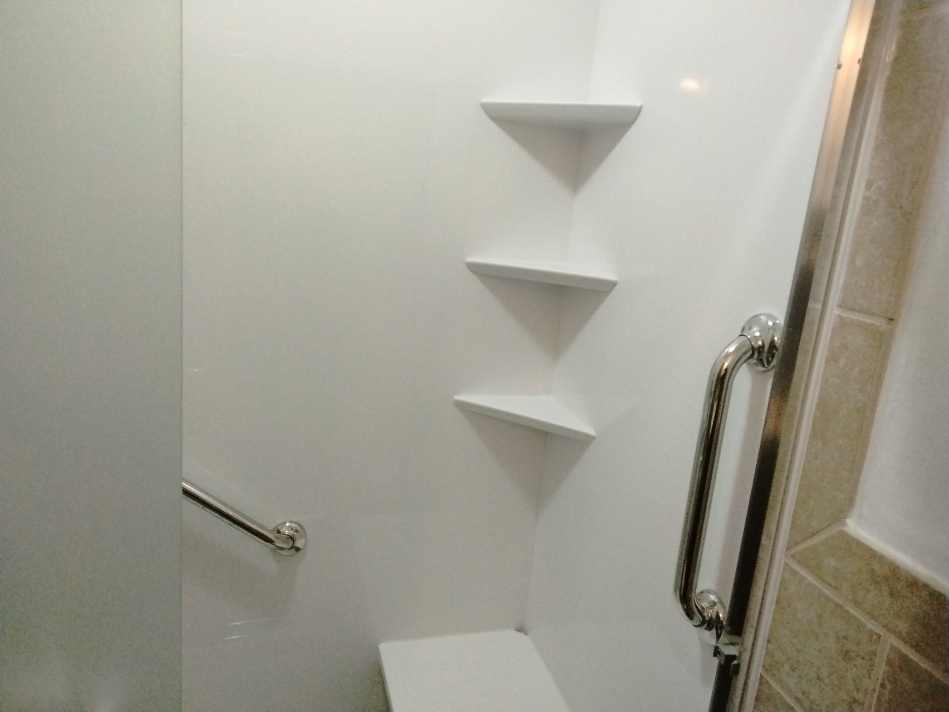 Tub to Shower Conversion using BCI Acrylic Shower System by Secure Construction Company Inc