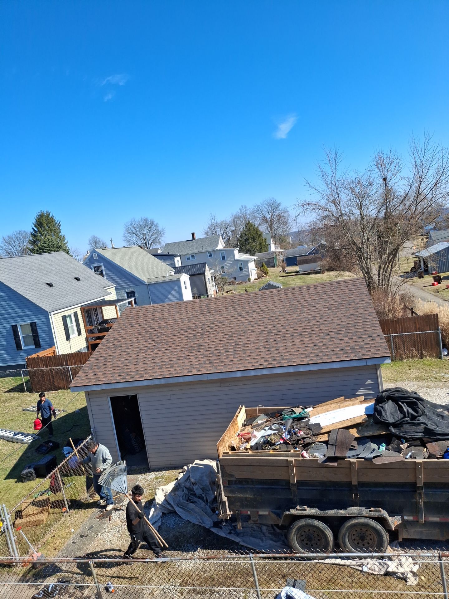 Residential Roofing Installation using GAF TImberline HDZ Hickory by Rainstoppers Roofing