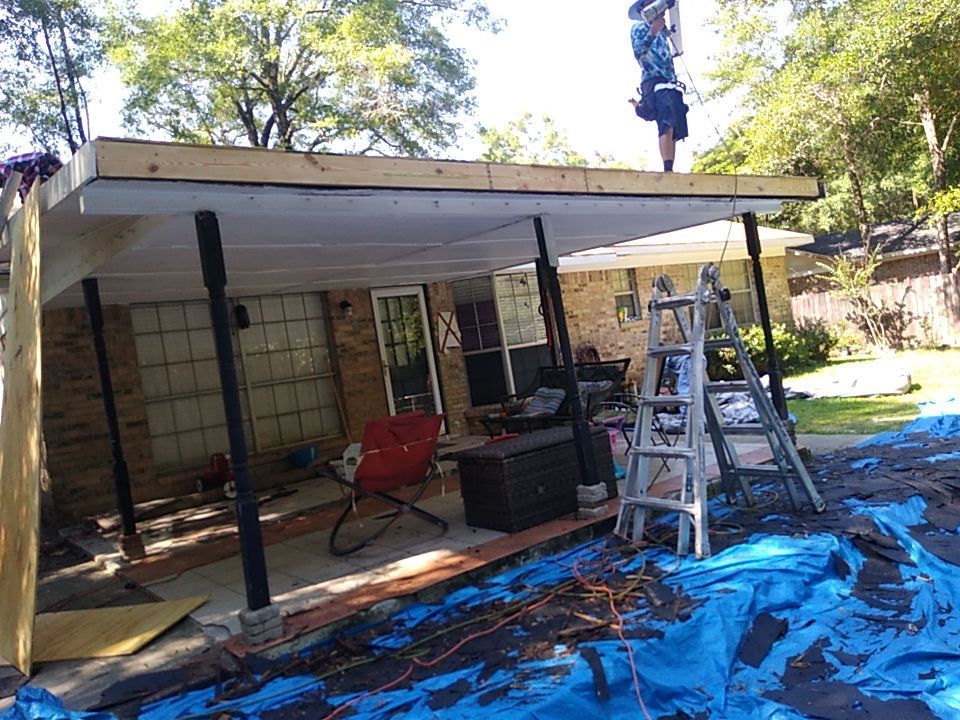 Residential Roofing Installation using Roof Replacement by American Roofing & Construction LLC