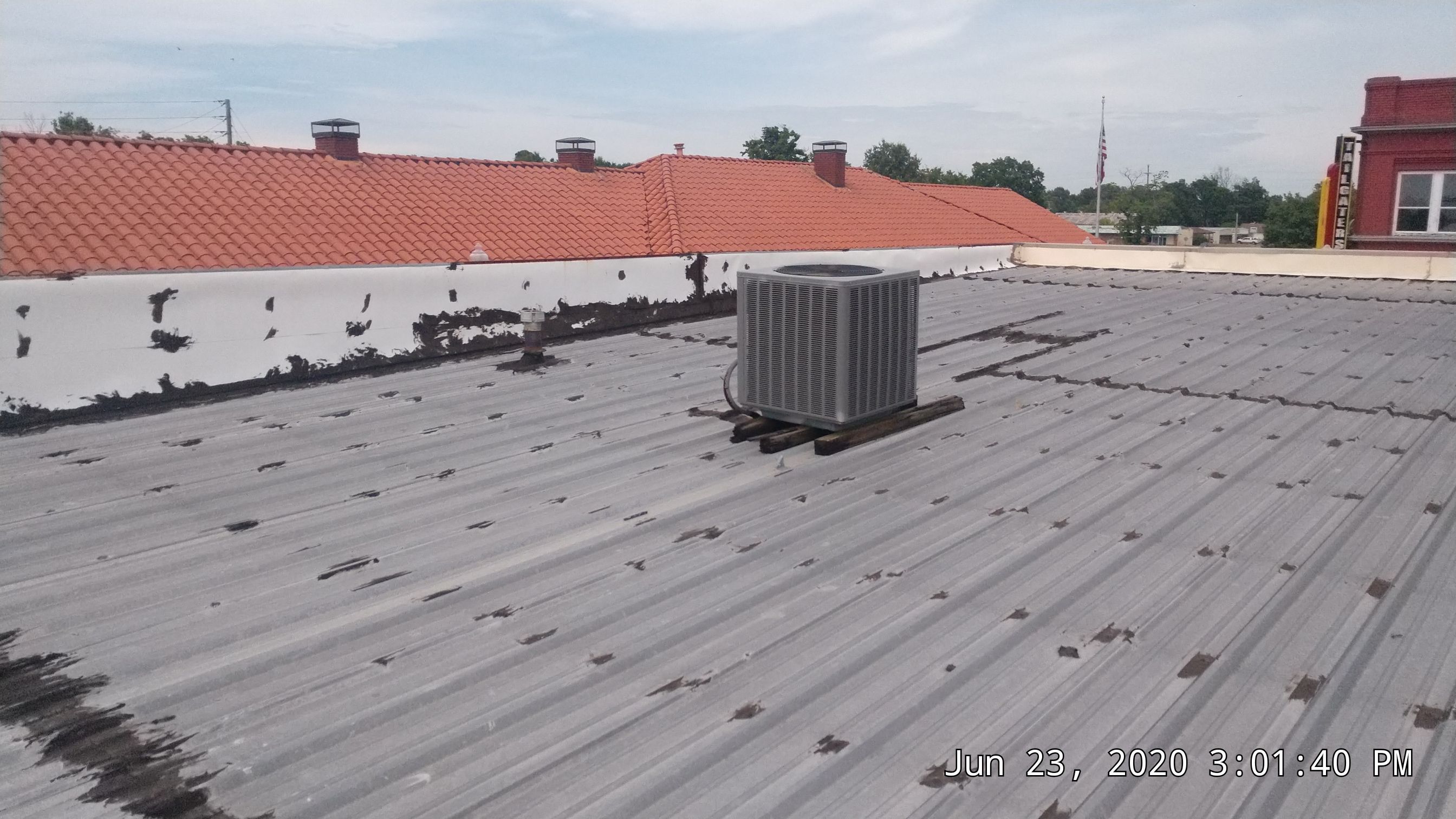 Commercial Metal Restoration System using Aldocoat Coatings by Hostetler Roofing