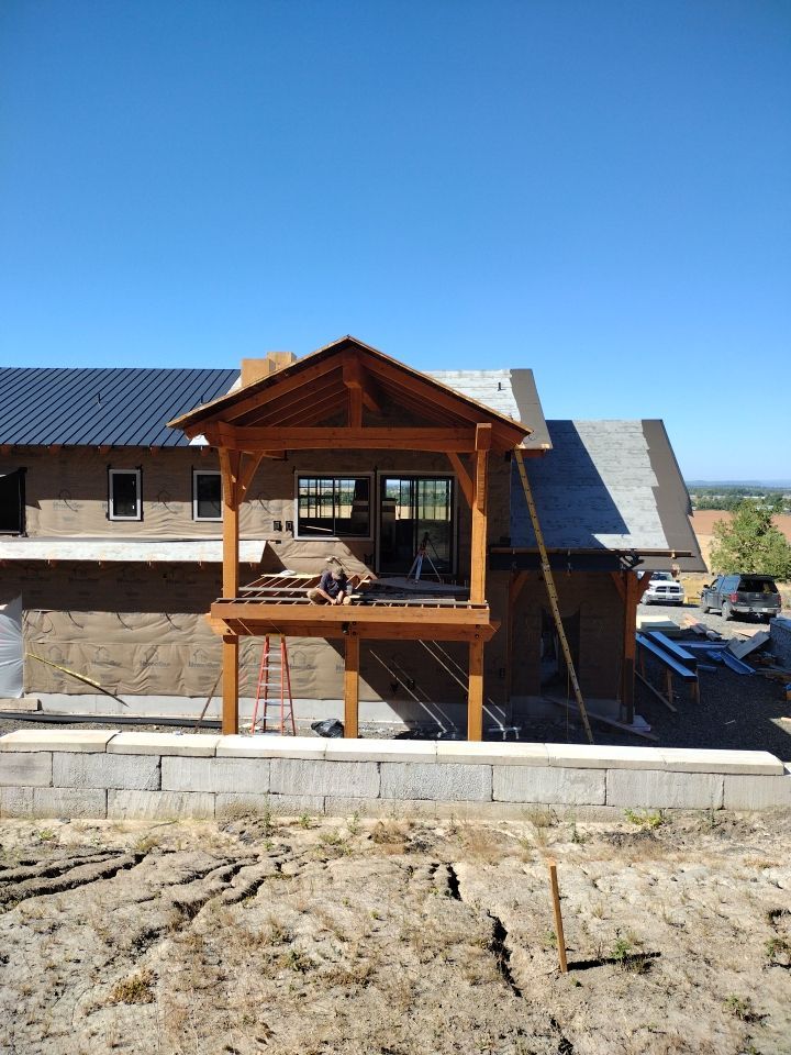 Residential Metal Roof Installation using Taylor Metal Snap Lock Metal Color: Black by Orezona Building & Roofing Company, Inc.