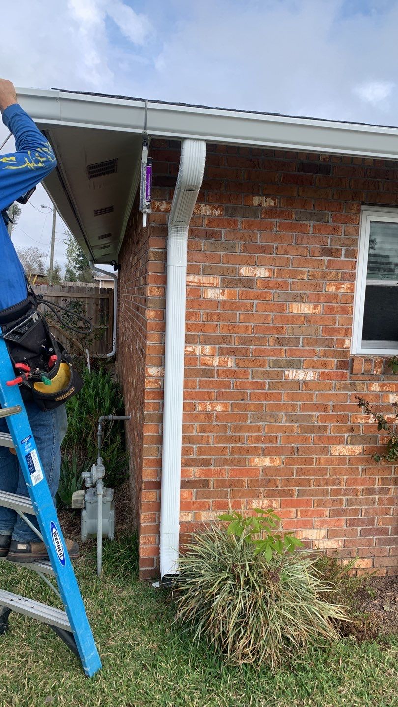 Seamless Aluminum Gutter and Down Spout Installation by Gutter Professors