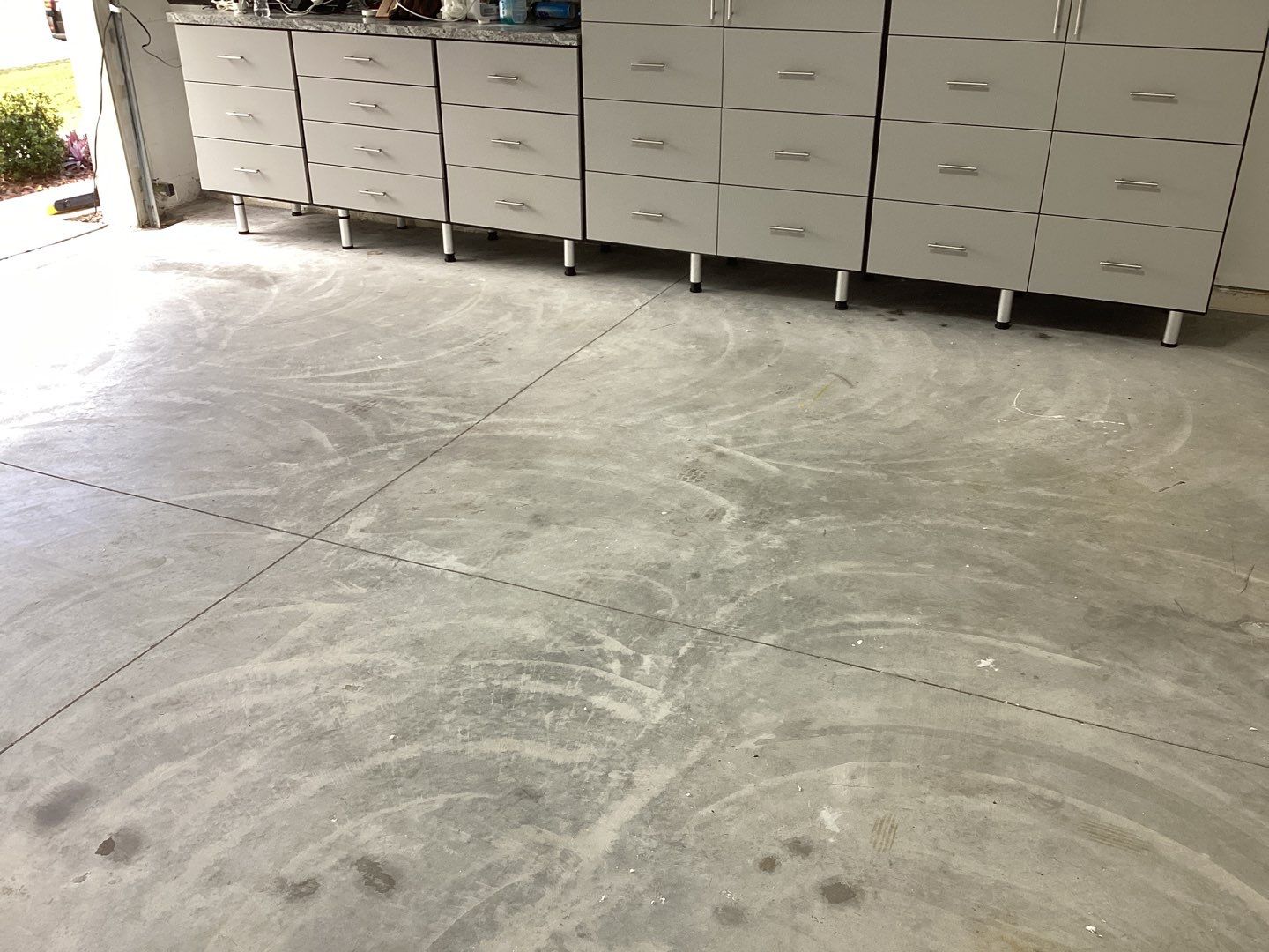 Garage using Domino by Amvet concrete coatings llc