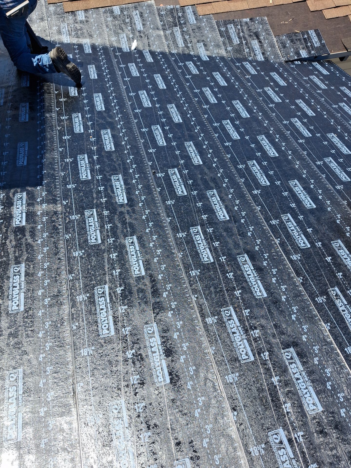 Chimneys need a Cricket.  by Bayfront Roofing and Construction