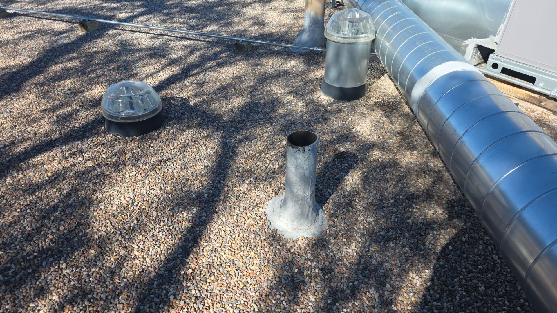 Tar and Gravel Roof Maintenance and Penetration Sealing in Albuquerque by Doyle Roof Masters Inc