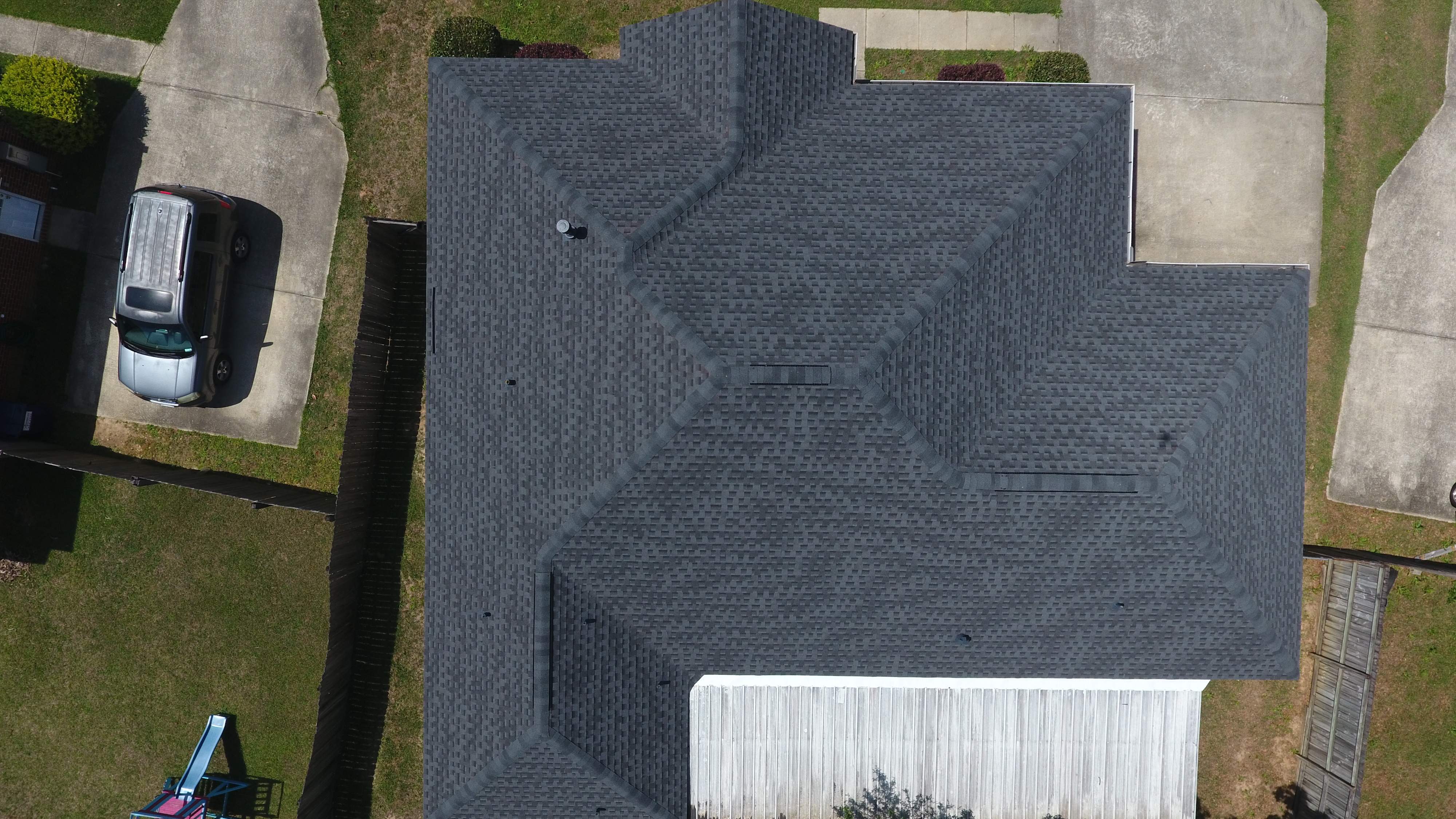 Residential Roofing Installation using Roof Replacement by American Roofing & Construction LLC