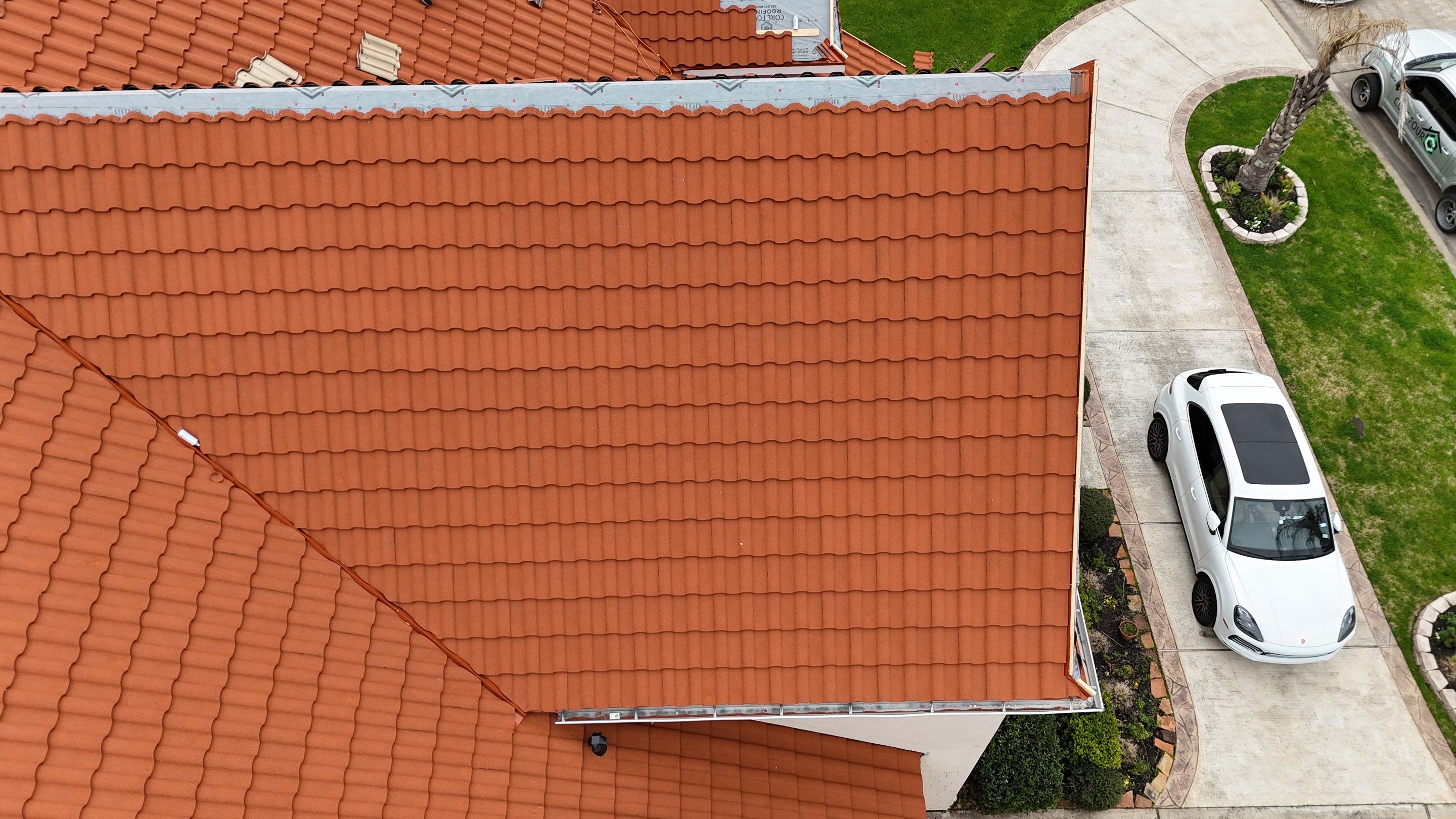 Stunning transformation using DECRA Villa Tile! by Core Four Roofing