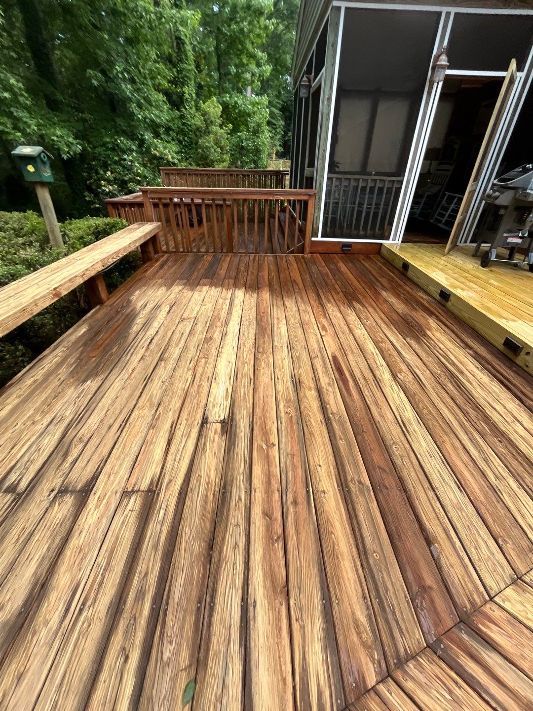 Triple deck re-staining by AKK Painting LLC