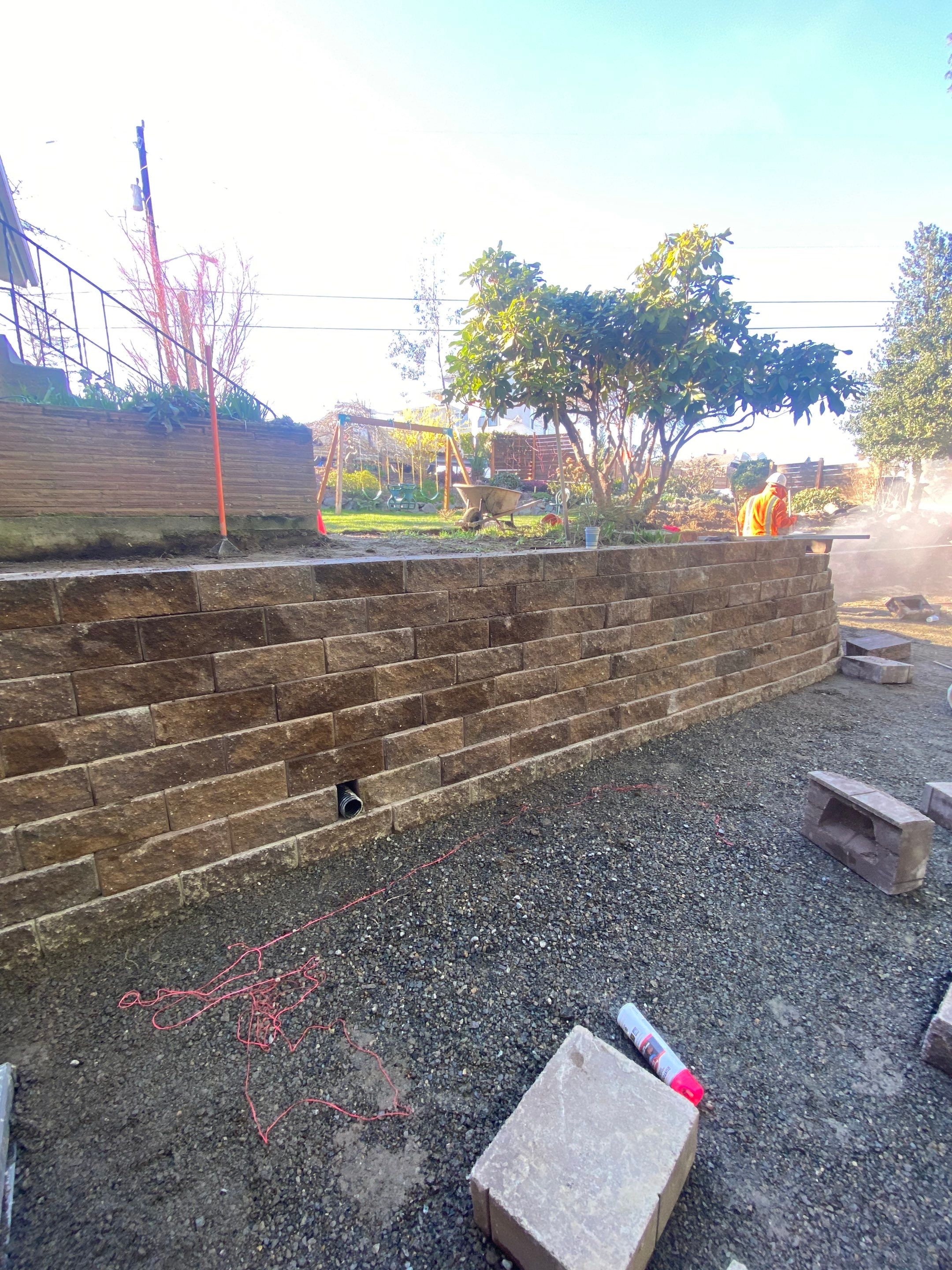 Lorra | Asphalt Driveway Repair & Retaining Wall by Jireh Asphalt & Concrete Inc 