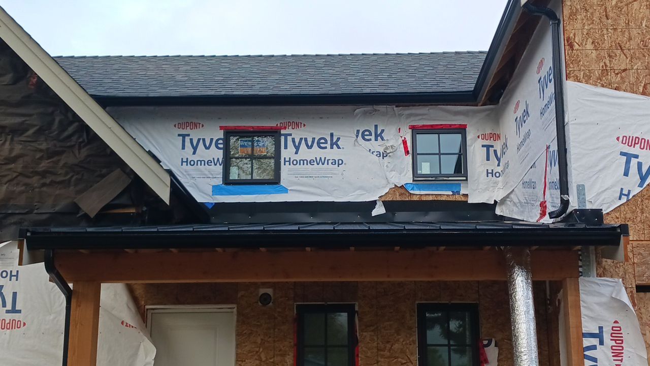 Residential Roofing Installation by Top Notch Roofing Inc