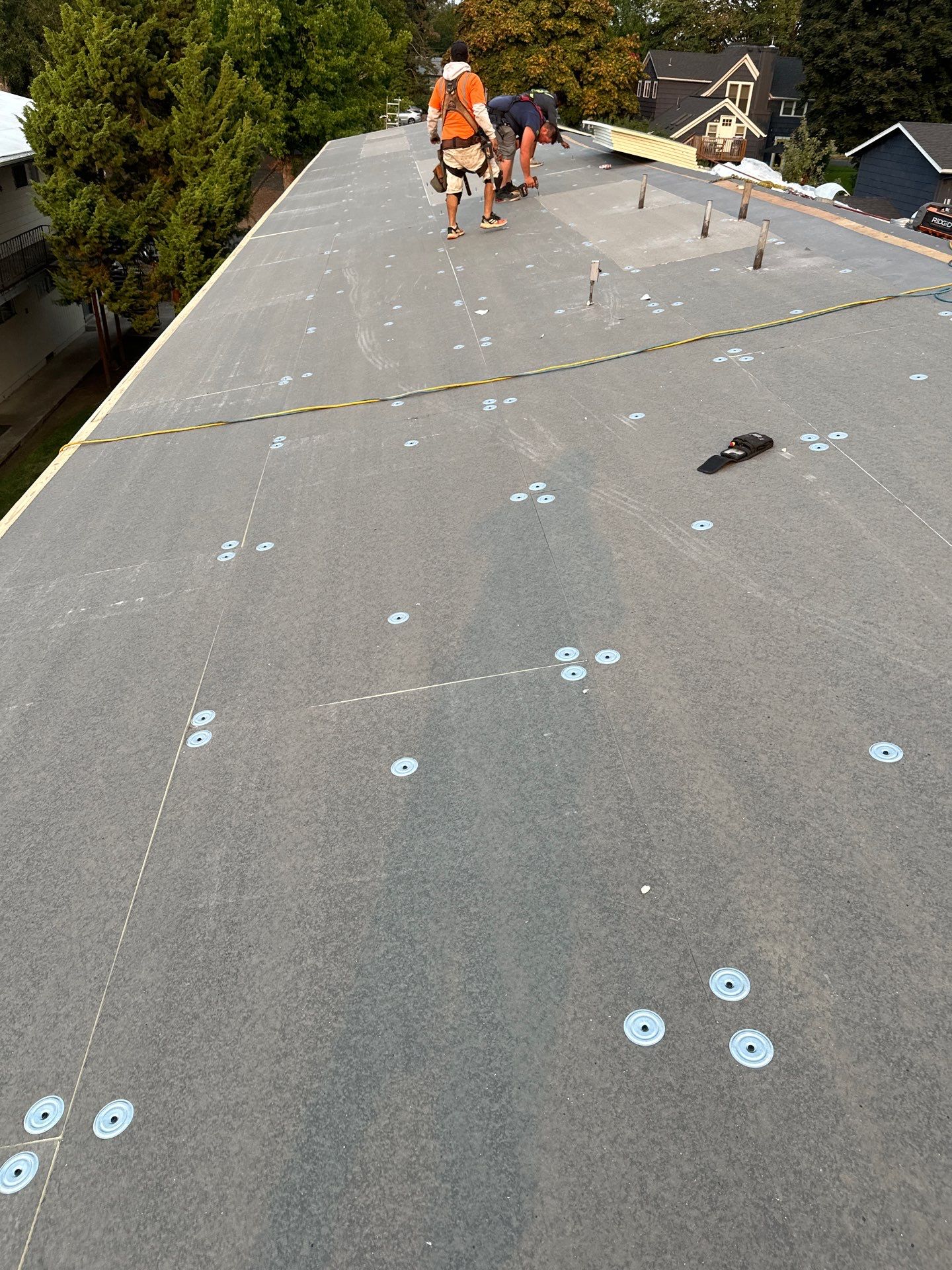 Commercial Flat Roof Installation using GAF 60Mil TPO  by Orezona Building & Roofing Company, Inc.