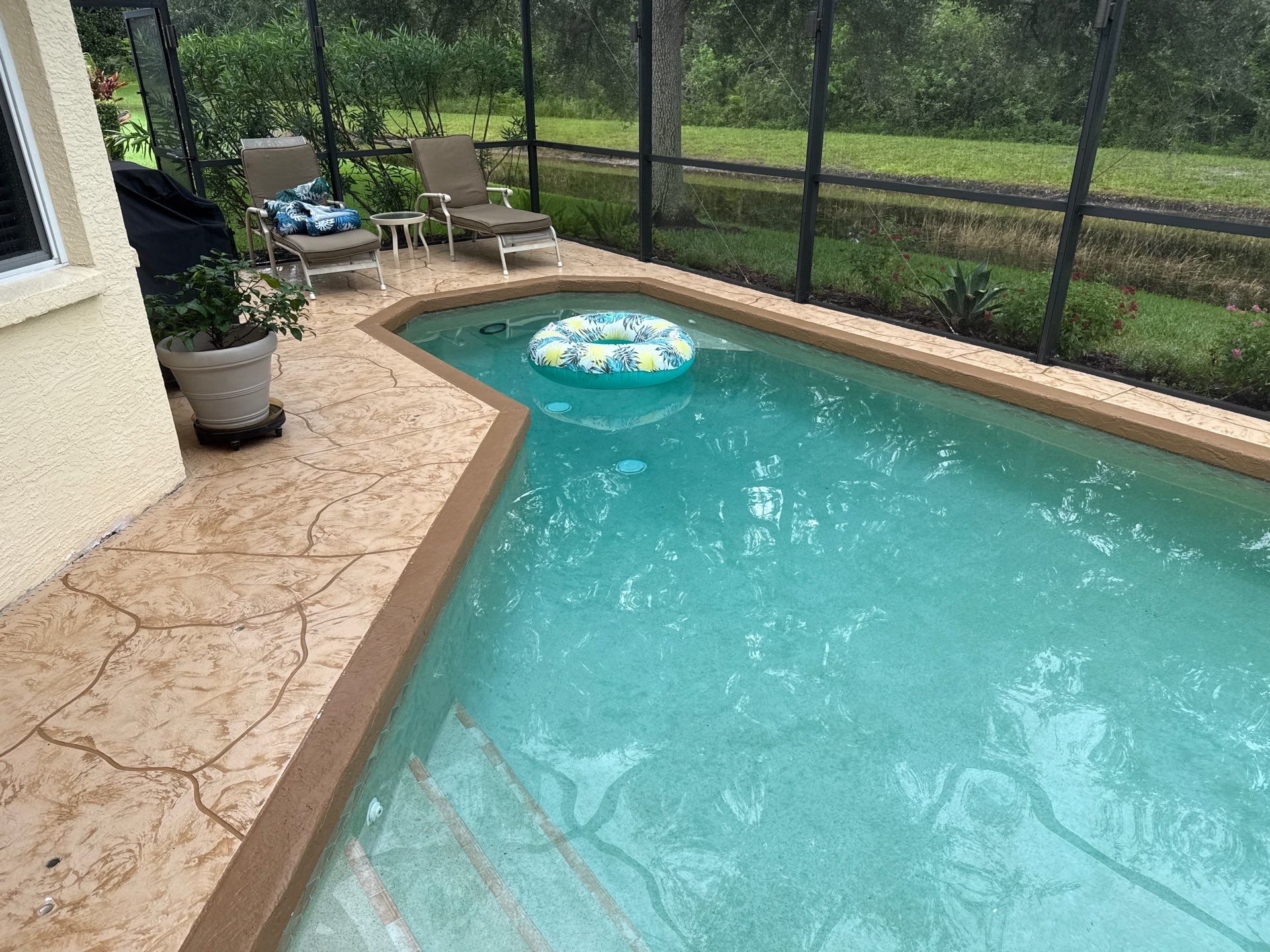 Painted Pool Deck, Screen Enclosure & Outdoor Furniture Cleaning – Tara Community, Bradenton, FL by Sunshine AquaWash