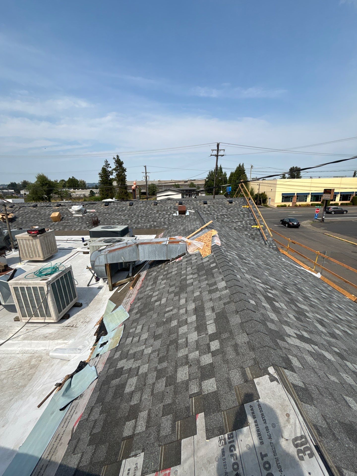 Summit Grey Lum Yun Salem Oregon Commercial Roof by Orezona Building & Roofing Company, Inc.