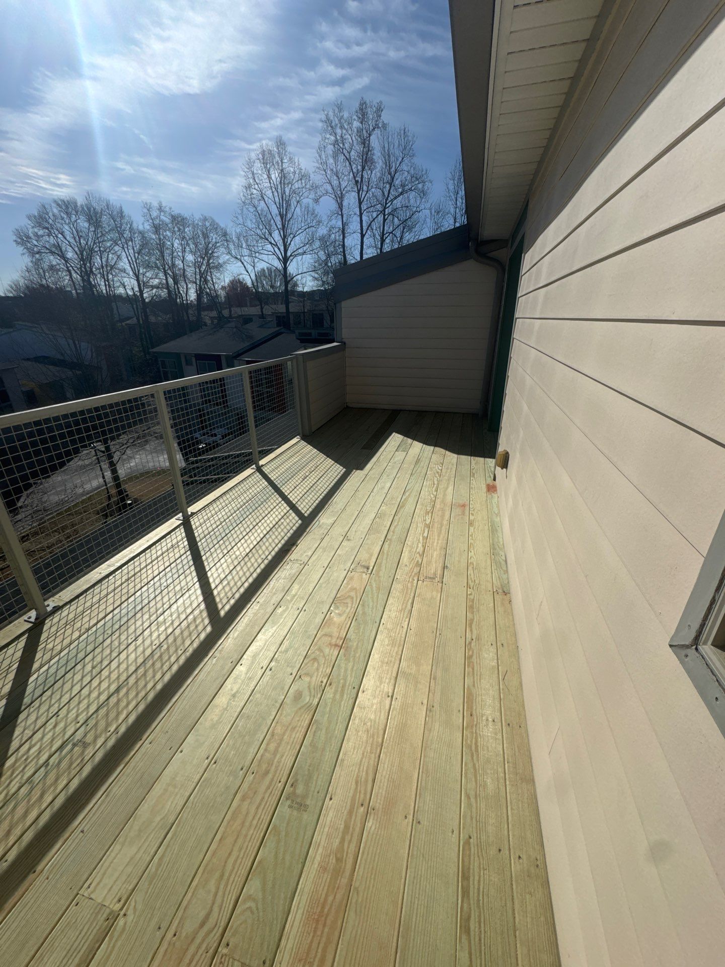 Atlanta Elevated Pressure-Treated Deck Installation With Mesh Railings by Swift Home Renovations 