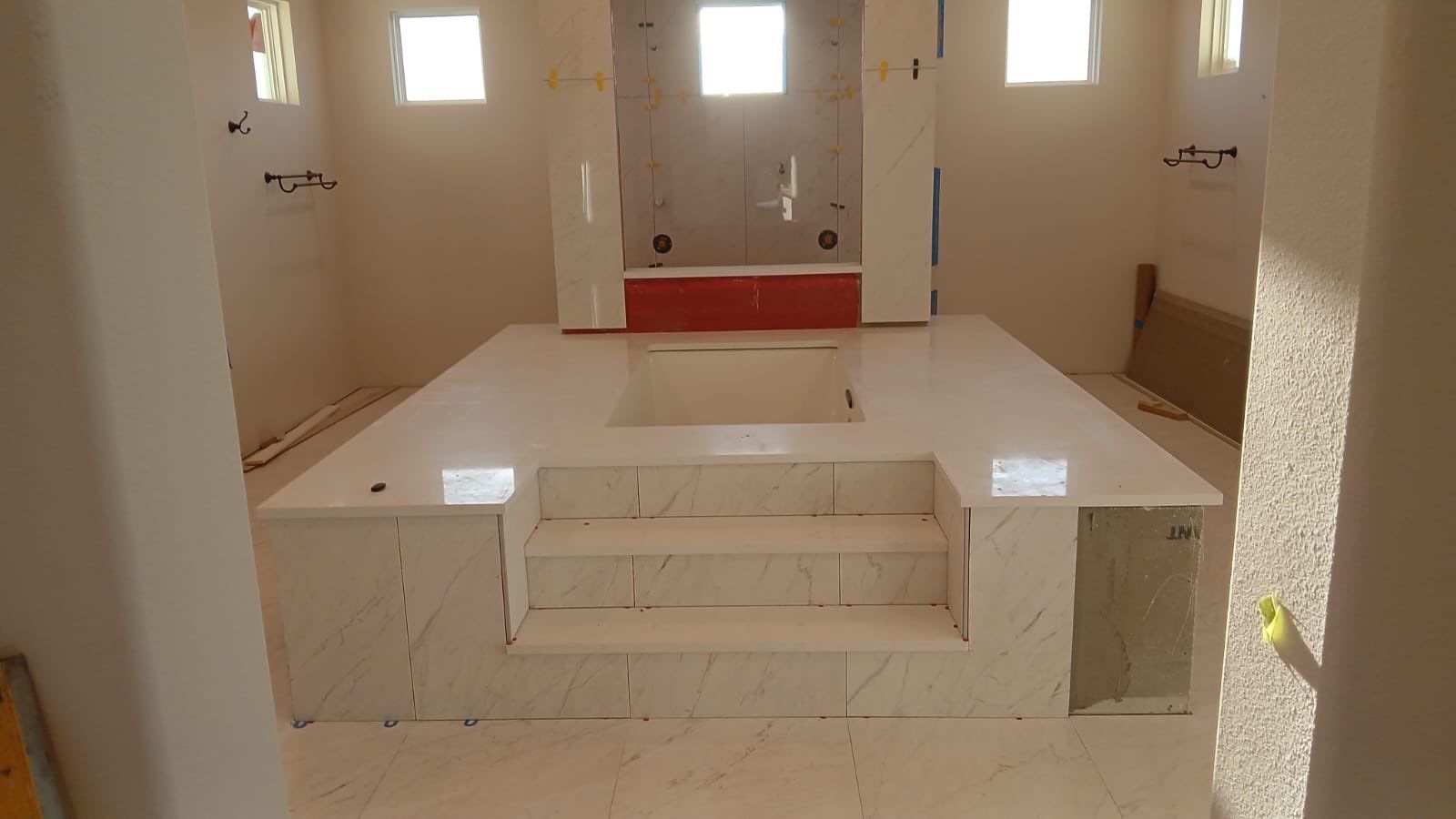 Kitchen and Bathroom Remodel Featuring Custom Stone and Tile in Mico by Mena stone surfaces