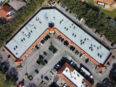 Modified Bitumen Commercial Roof Installation for Tampa Strip Mall