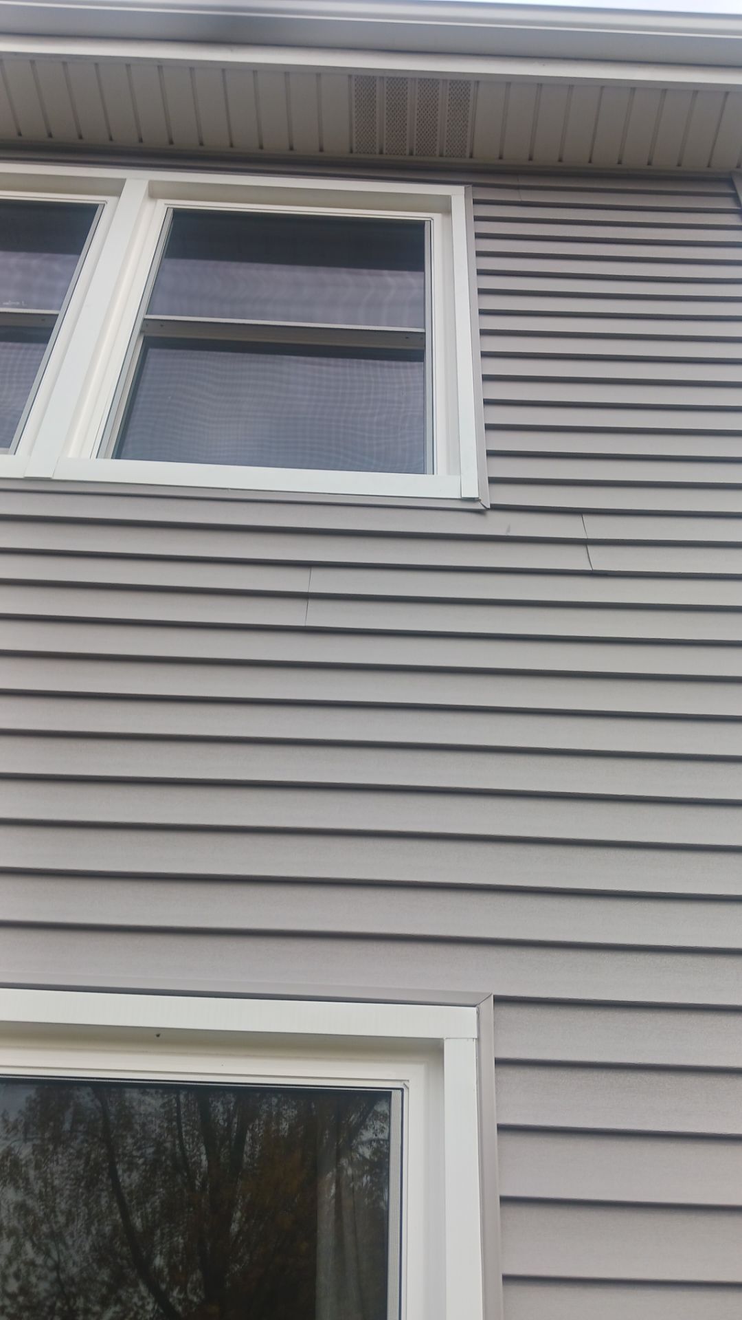 New Siding and Windows by NextWave Construction